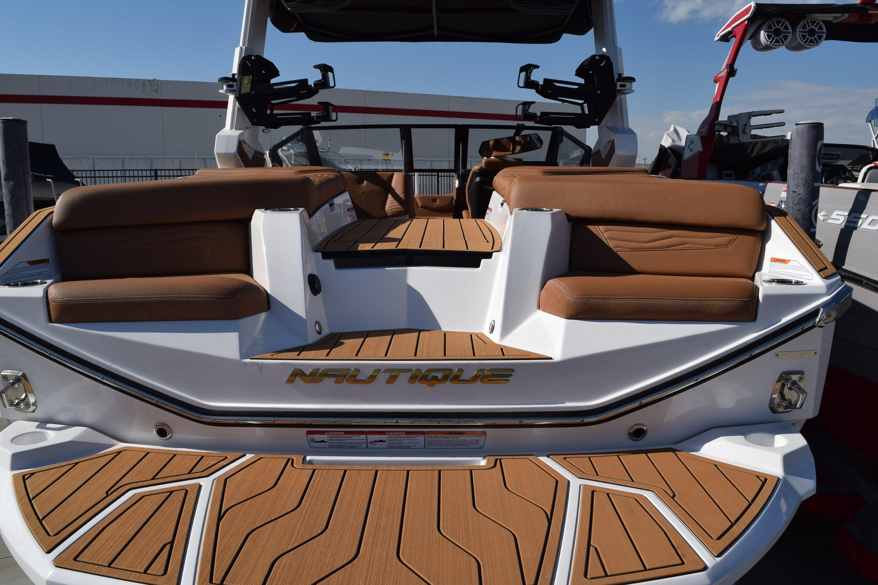 2026 Nautique Super Air Nautique G23 boat with luxurious seating and sleek design.