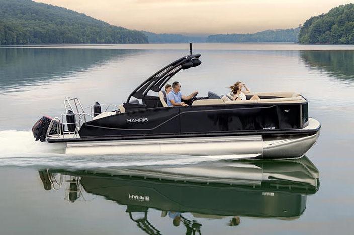 Manufacturer Provided Image: 2026 Harris Sunliner 250 pontoon boat cruising on a serene lake.