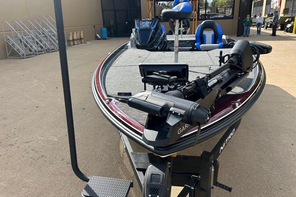 2026 Nitro Z21 XL Pro boat with advanced Garmin equipment, parked outdoors.