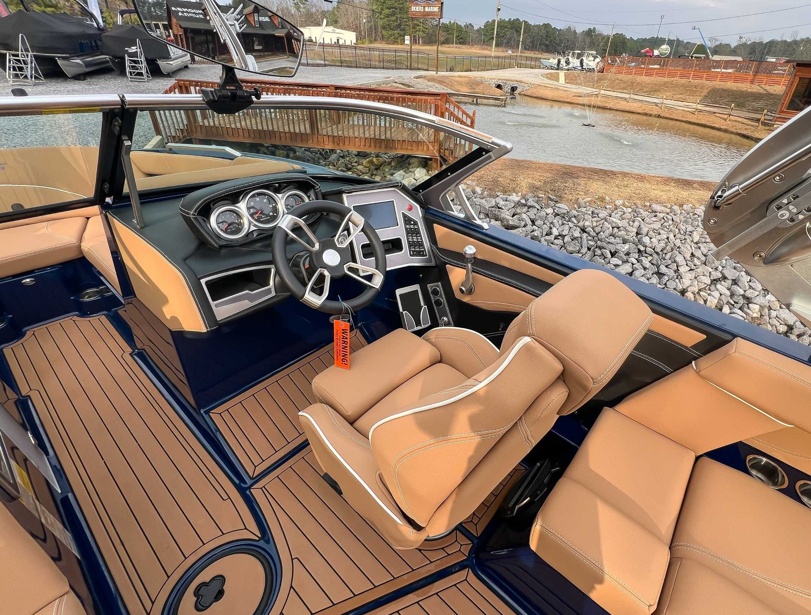 Interior of a 2021 MasterCraft XT22 boat with luxurious seating.