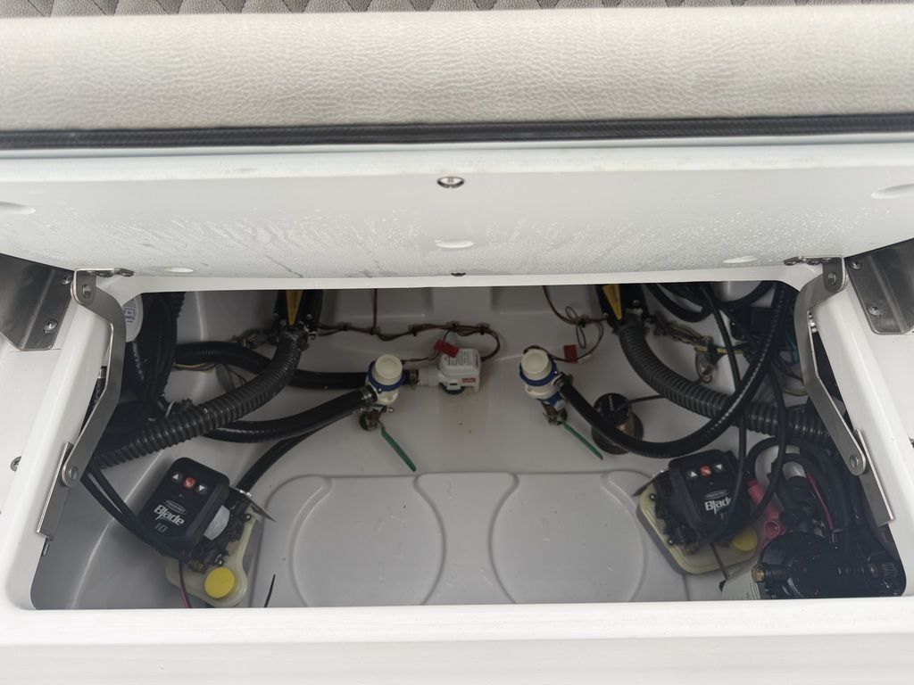 View of the engine compartment of a 2025 Sportsman Masters 247OE Bay Boat.