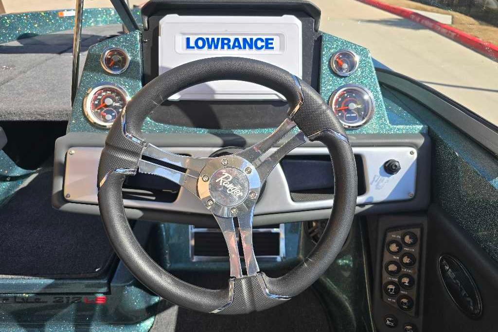 2026 Ranger 212LS boat dashboard with steering wheel and Lowrance display.
