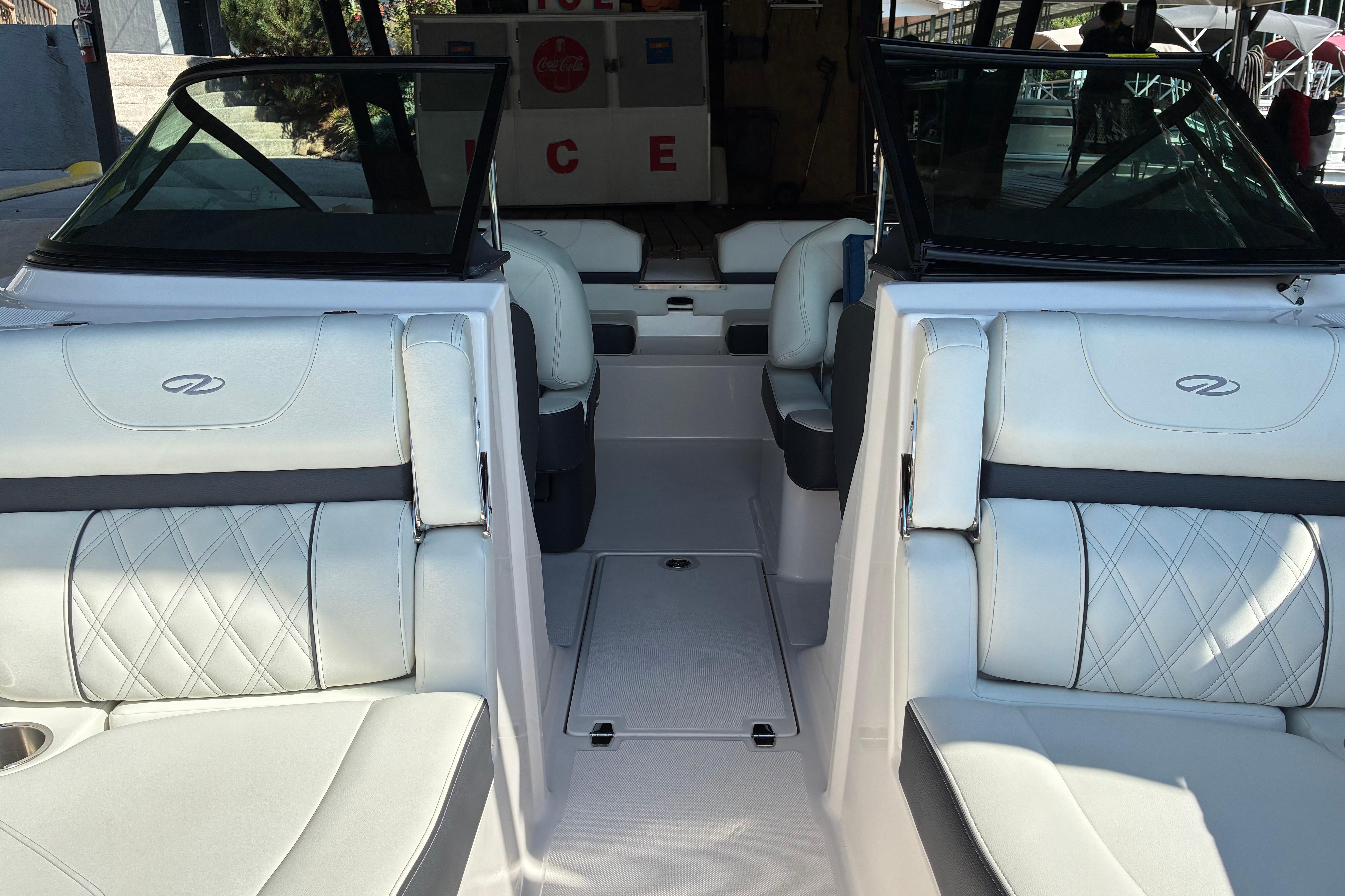 2025 Regal LS2 boat interior with white leather seating and modern design.