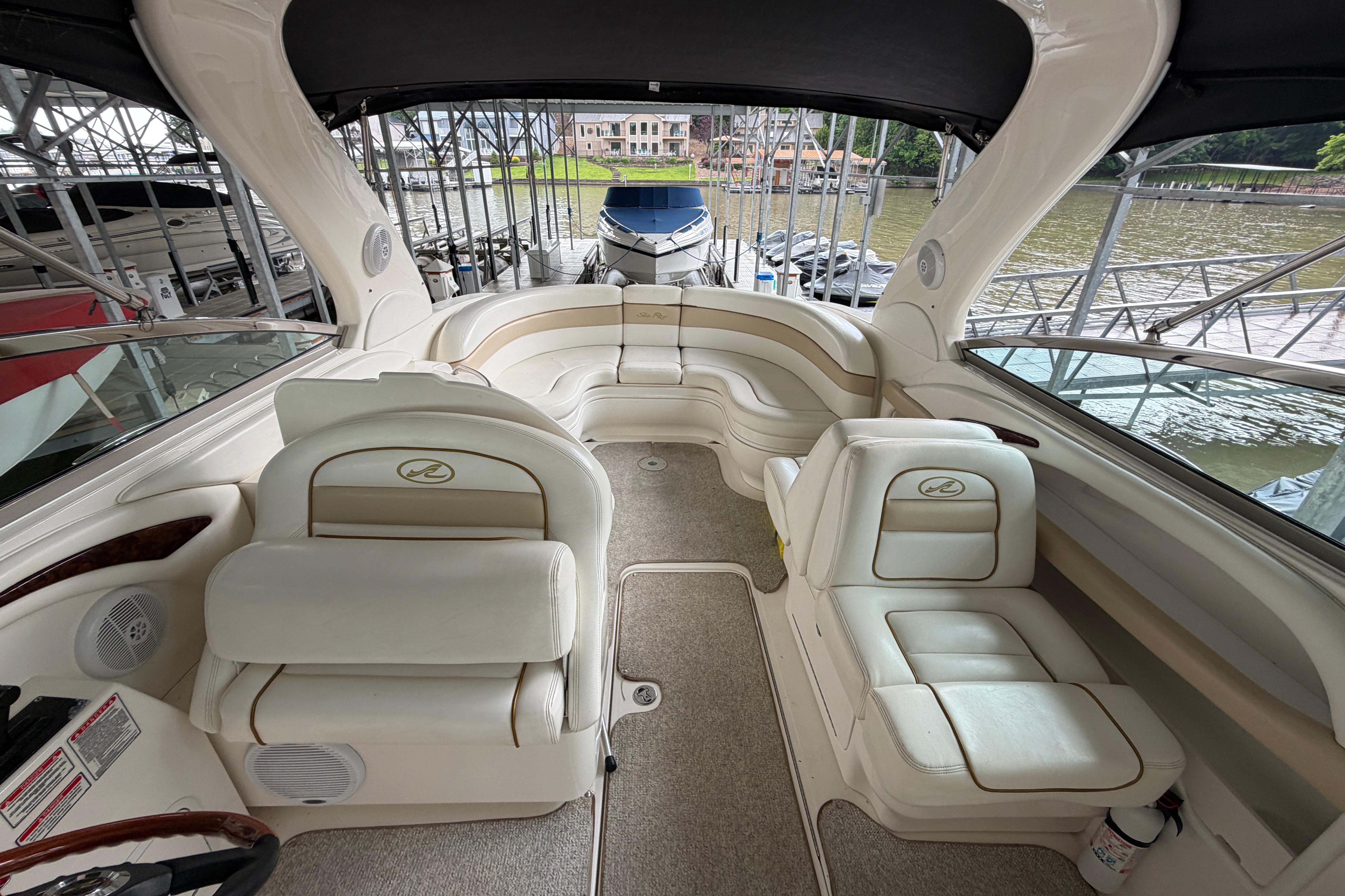 2003 Sea Ray 290 Bowrider interior with plush seating and elegant design.