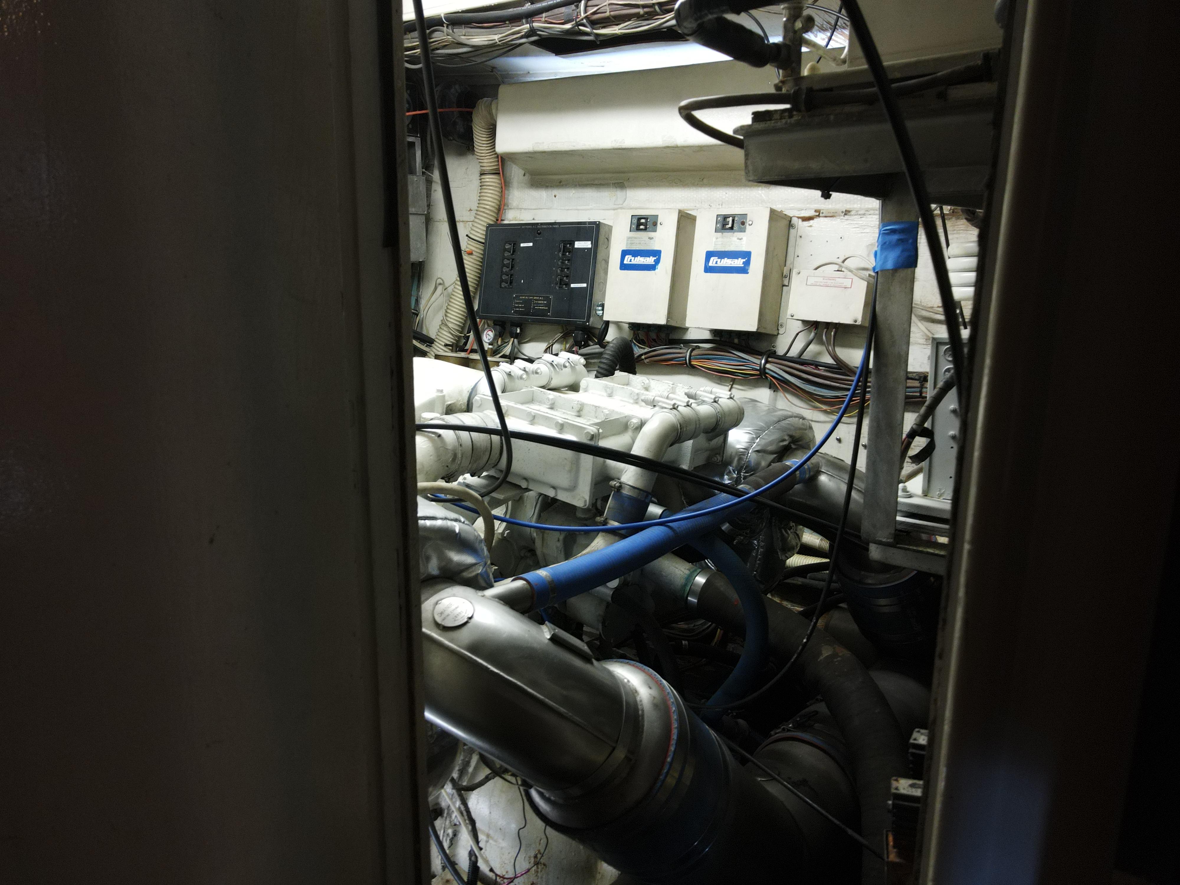 Engine room of 1979 Hatteras 58 Cockpit Motor Yacht.