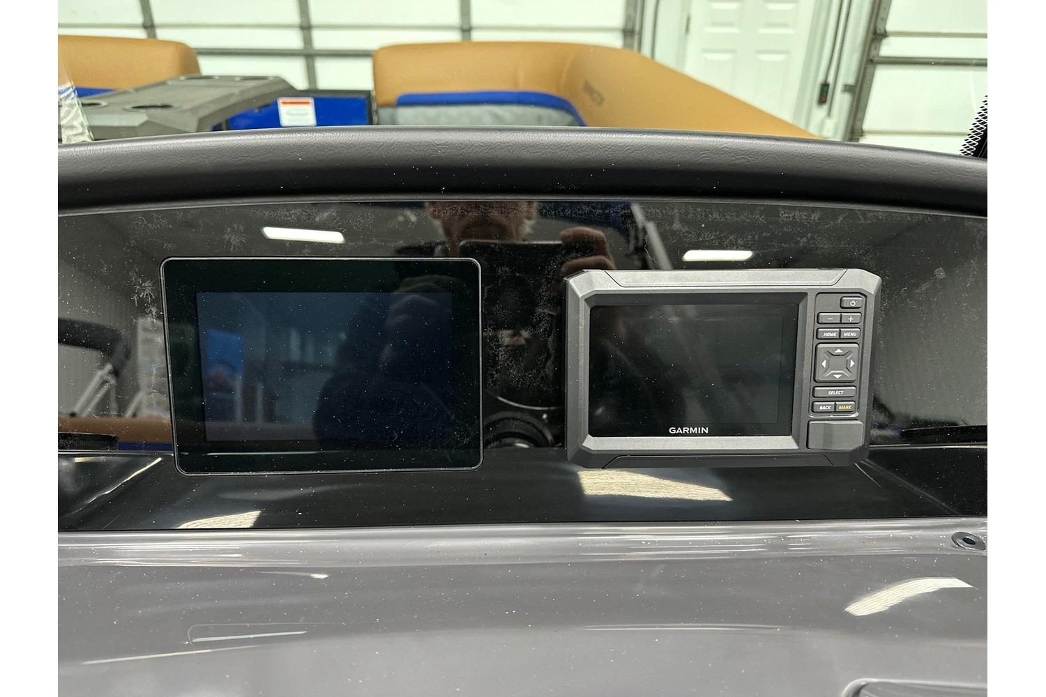 Dashboard of 2026 Bennington 22 SSB Swingback with Garmin display in stock.