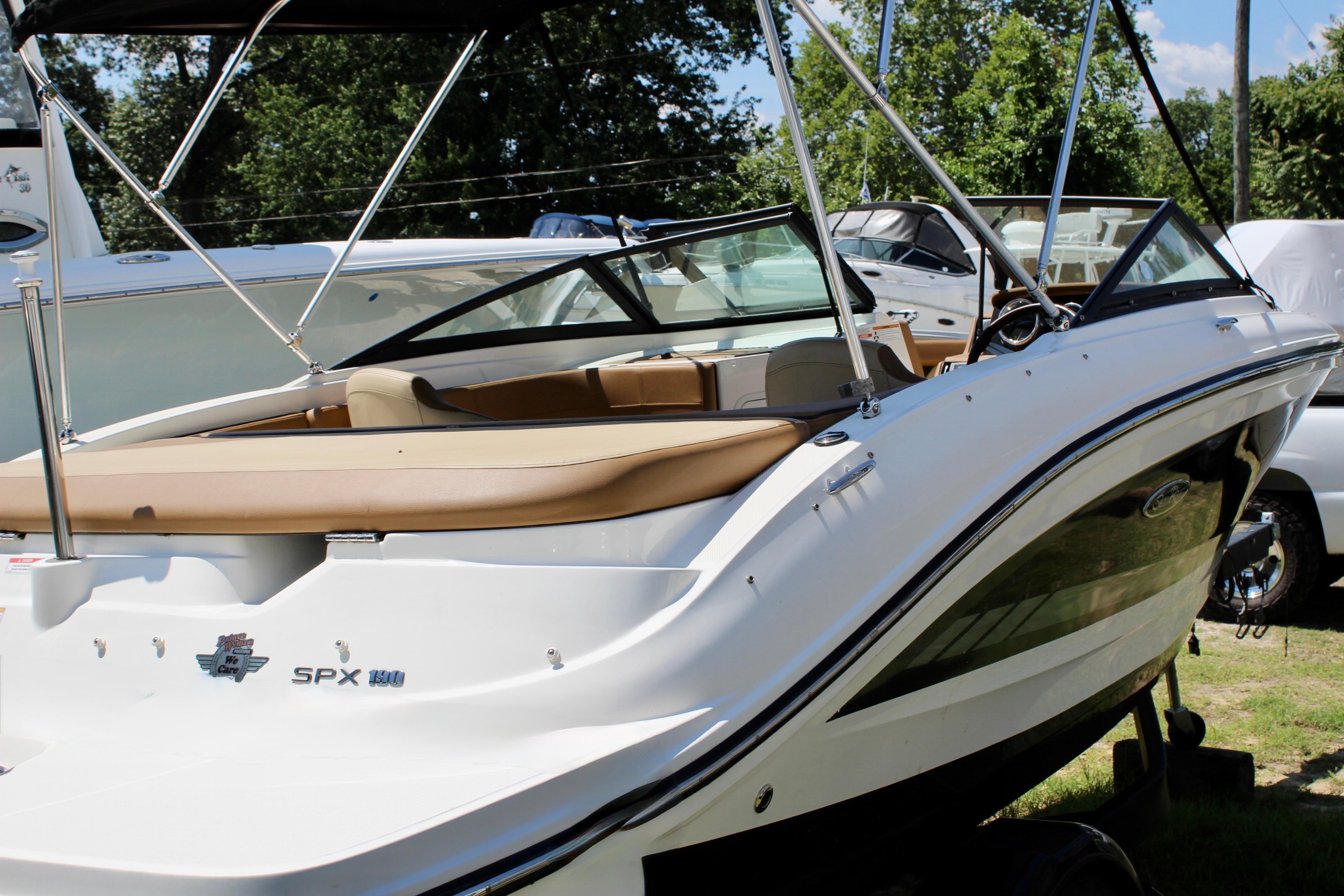 2018 Sea Ray SPX 190 Outboard boat with sleek design and comfortable seating.