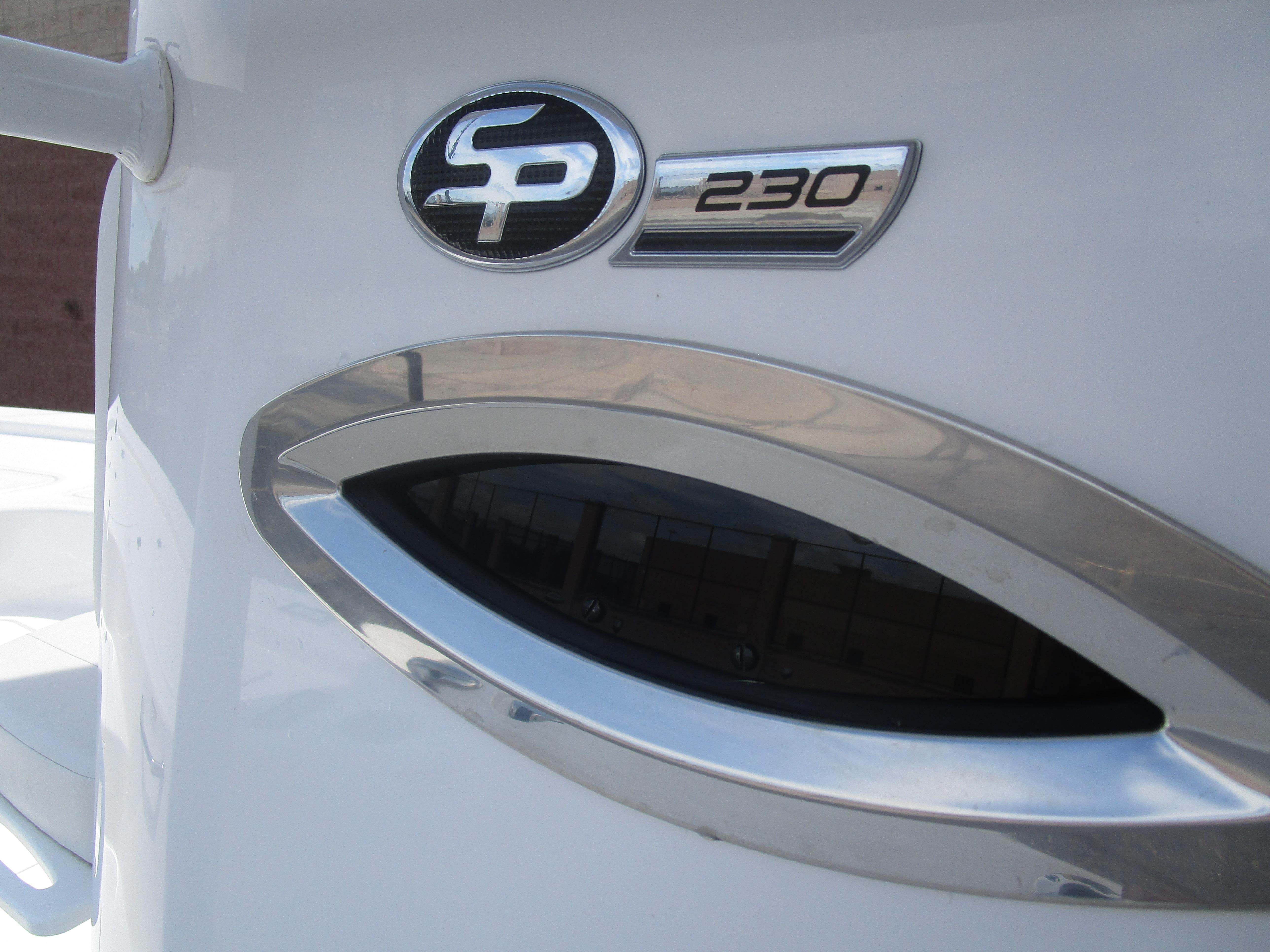 2025 Sea Pro 230 DLX BAY boat emblem and design detail.