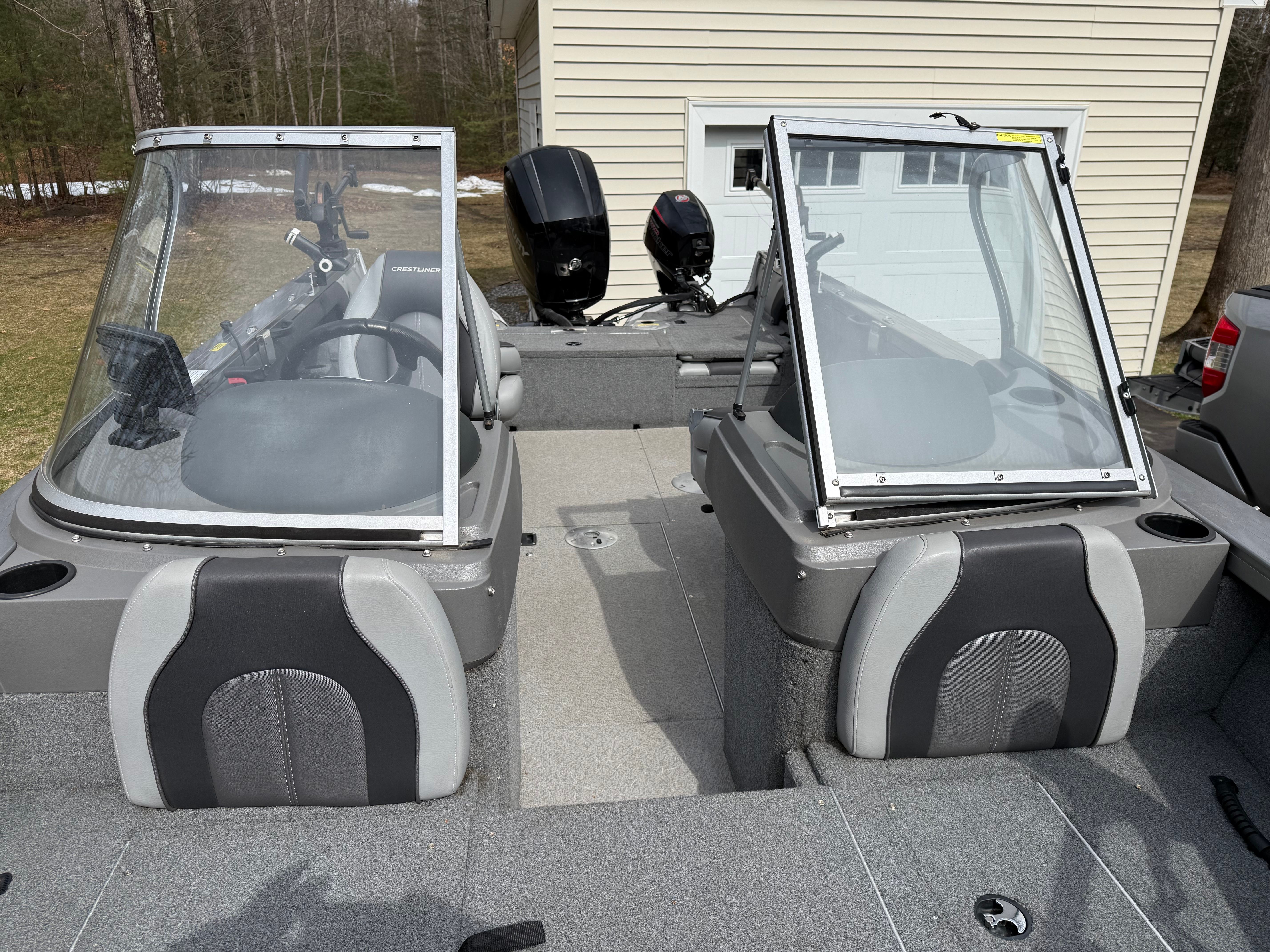 Interior view of a 2015 Crestliner 1850 boat with two seats.
