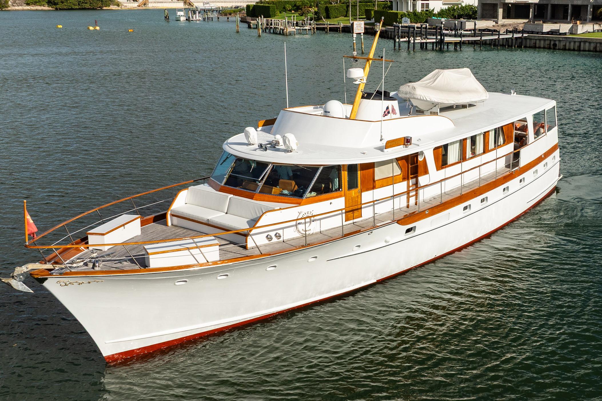 Classic 1972 Trumpy 72 Motor Yacht cruising on calm waters.