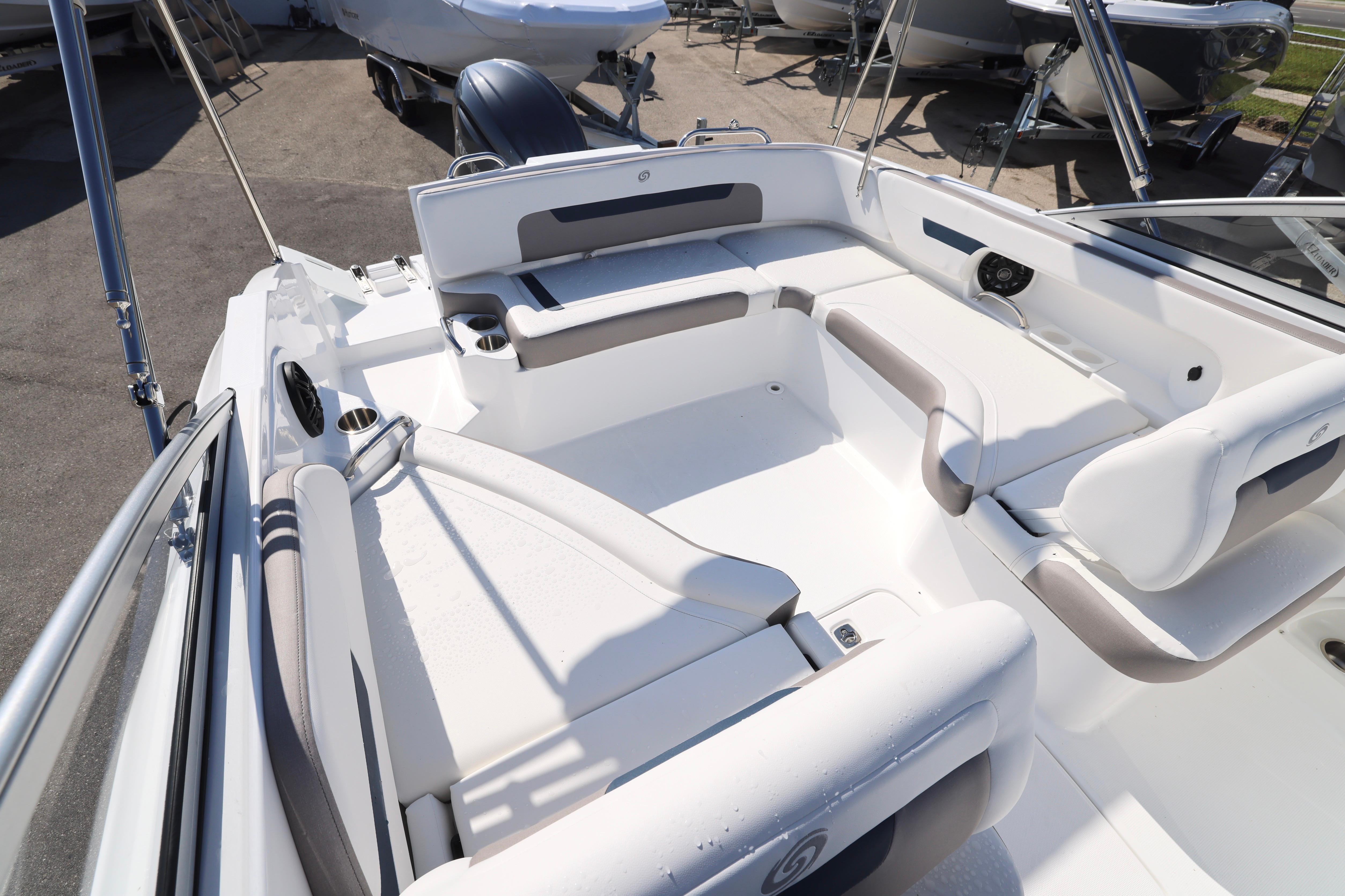 2026 Hurricane SunDeck 235 OB boat interior with spacious seating and modern design.