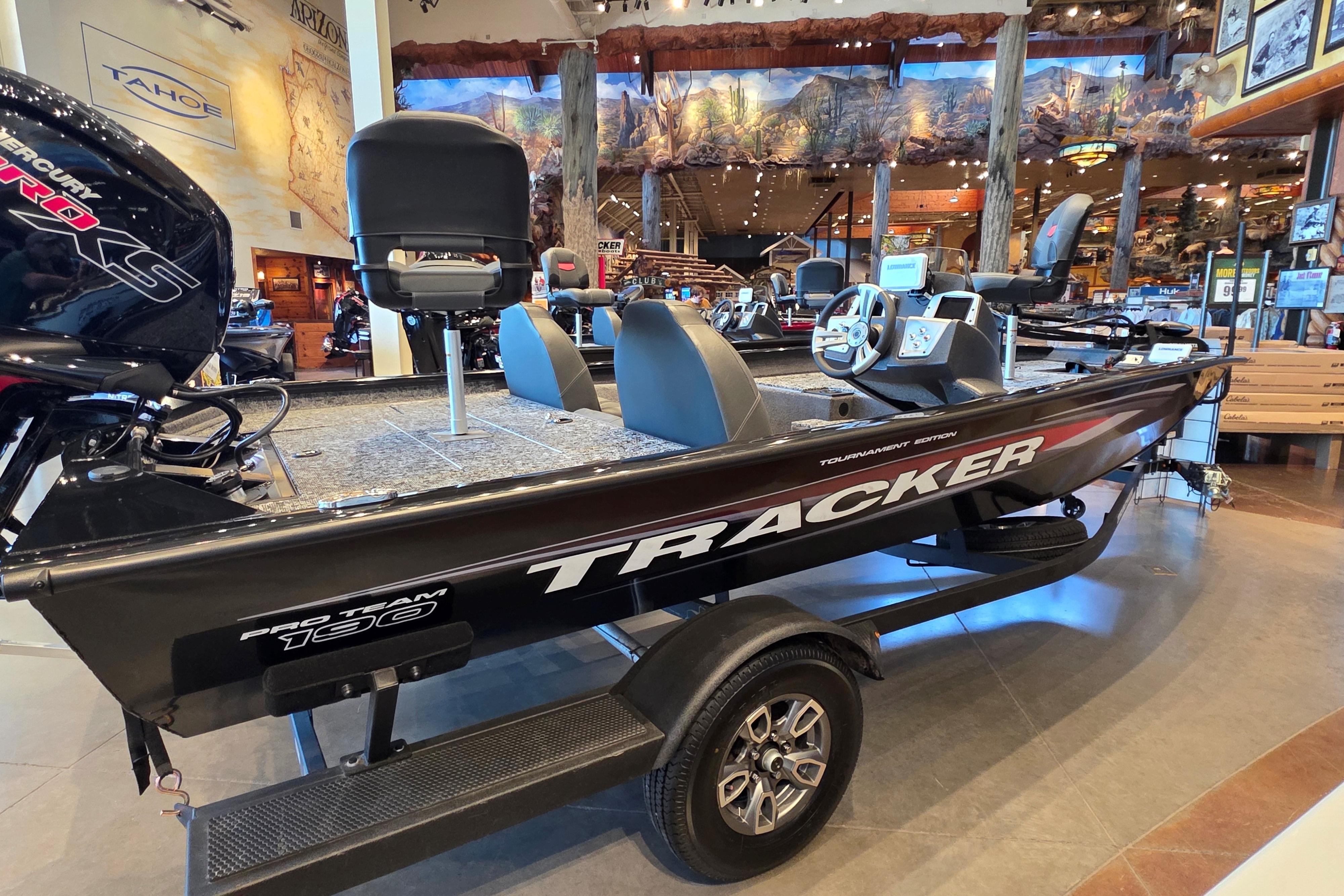 2026 Tracker Pro Team 190 boat displayed in a showroom, featuring sleek design and modern equipment.