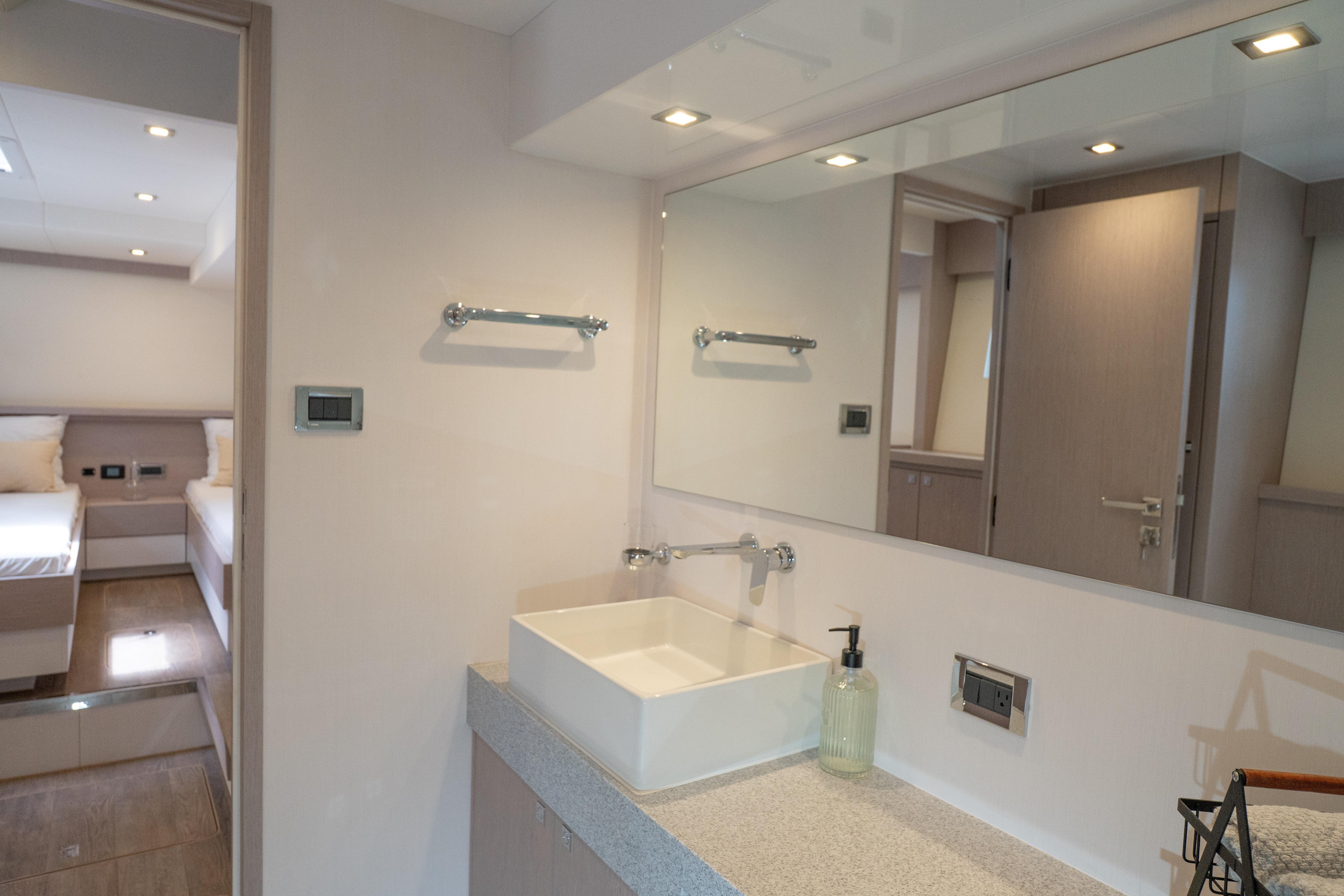 Modern bathroom interior on 2023 Alva Yachts Ocean Eco 54, featuring sleek design and amenities.