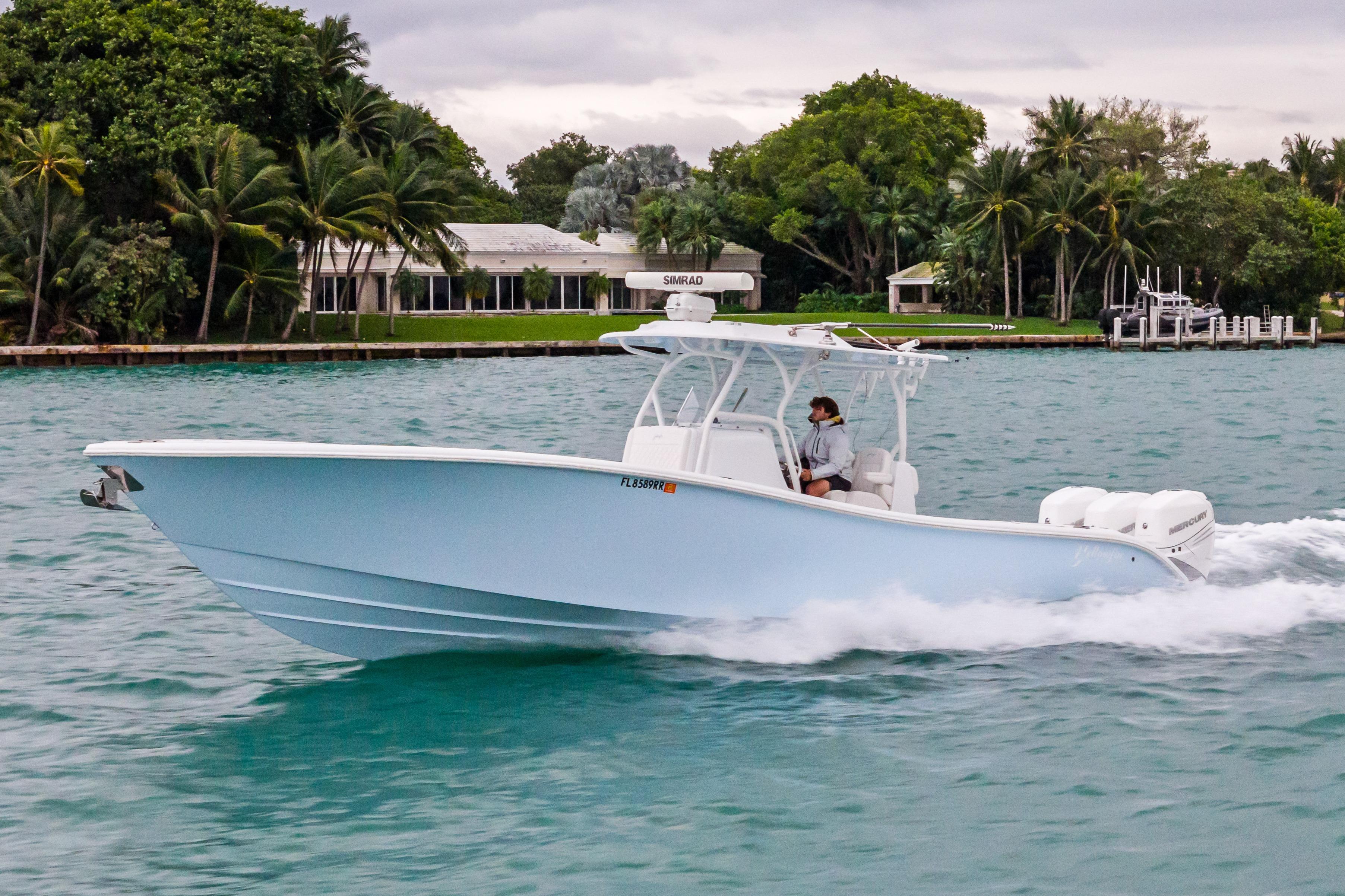 2021 Yellowfin 36 Offshore boat cruising on a scenic waterway.