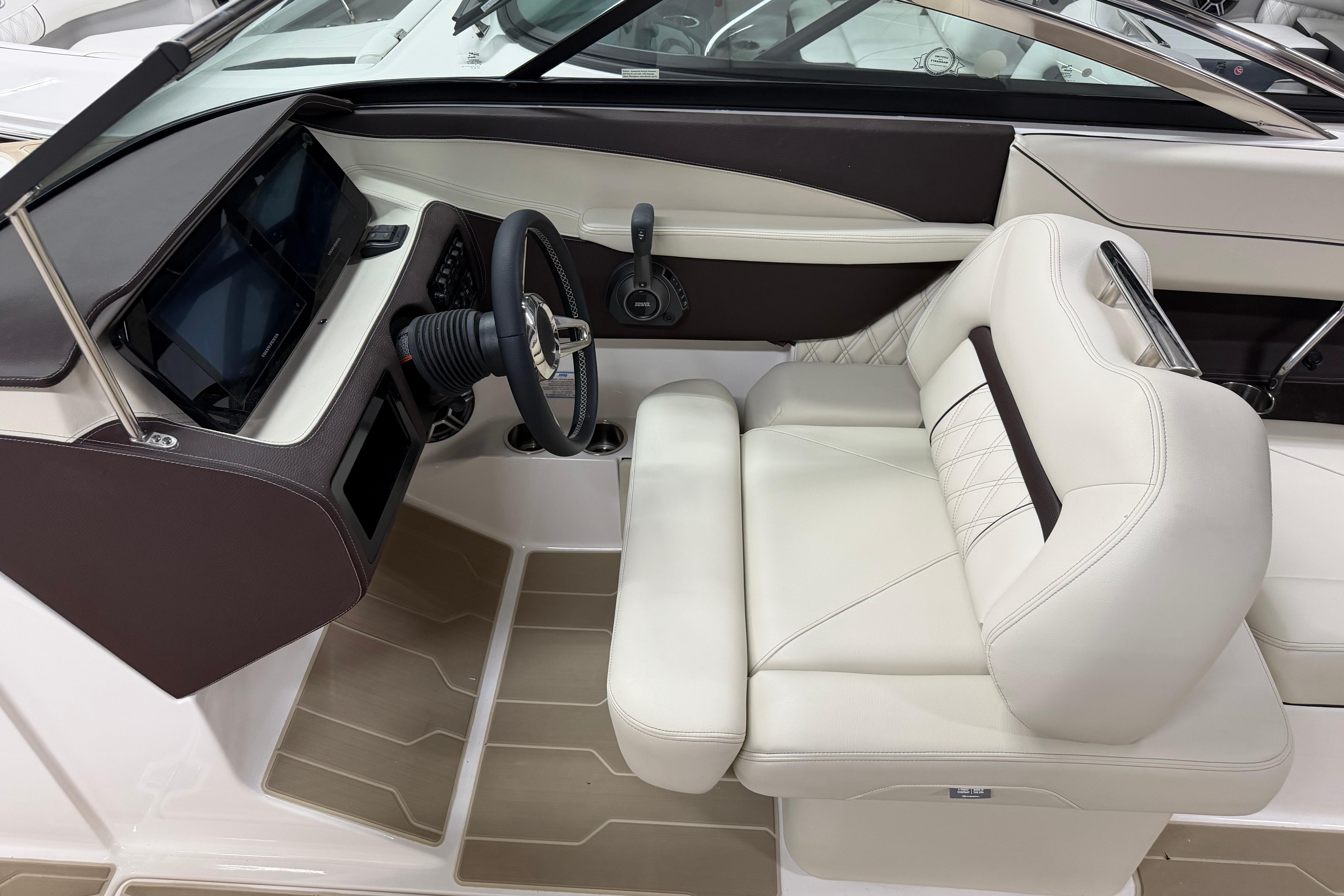 Luxurious interior of 2026 Regal LS6 boat with plush seating and modern dashboard.