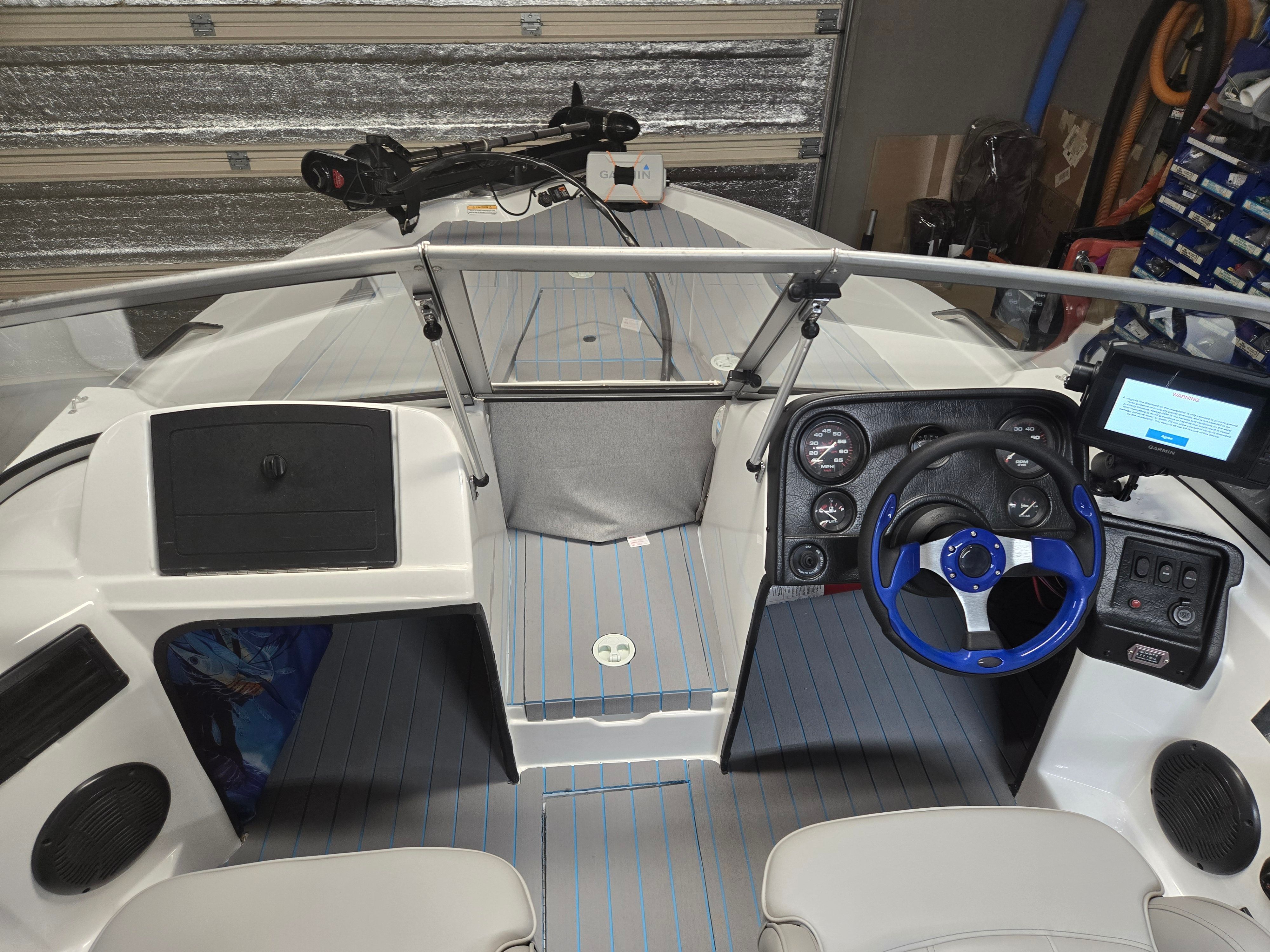 Interior view of a 2007 ProCraft 170 Combo with steering console and seating.