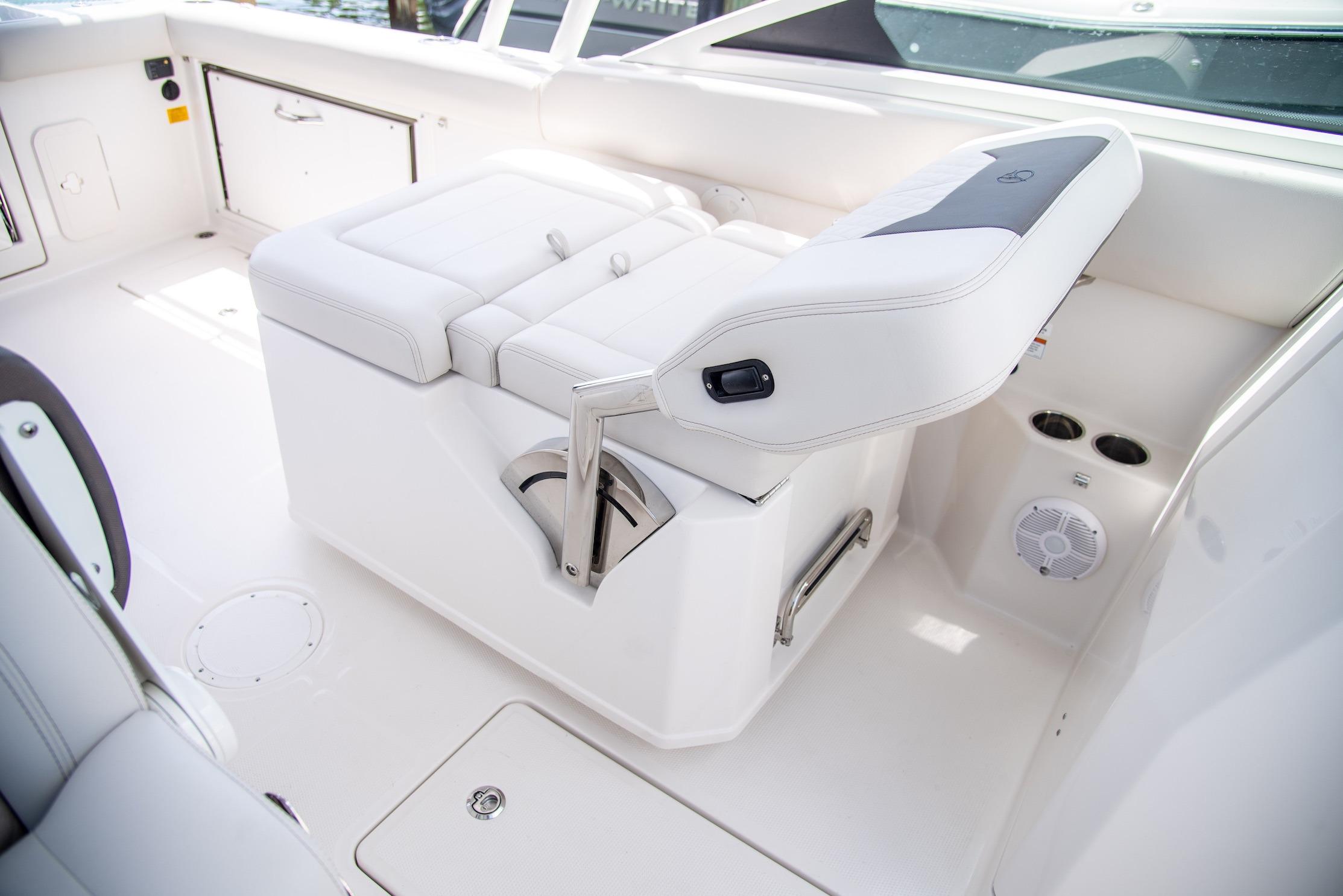 2027 Sailfish 276 DC boat interior with white seating and modern design.