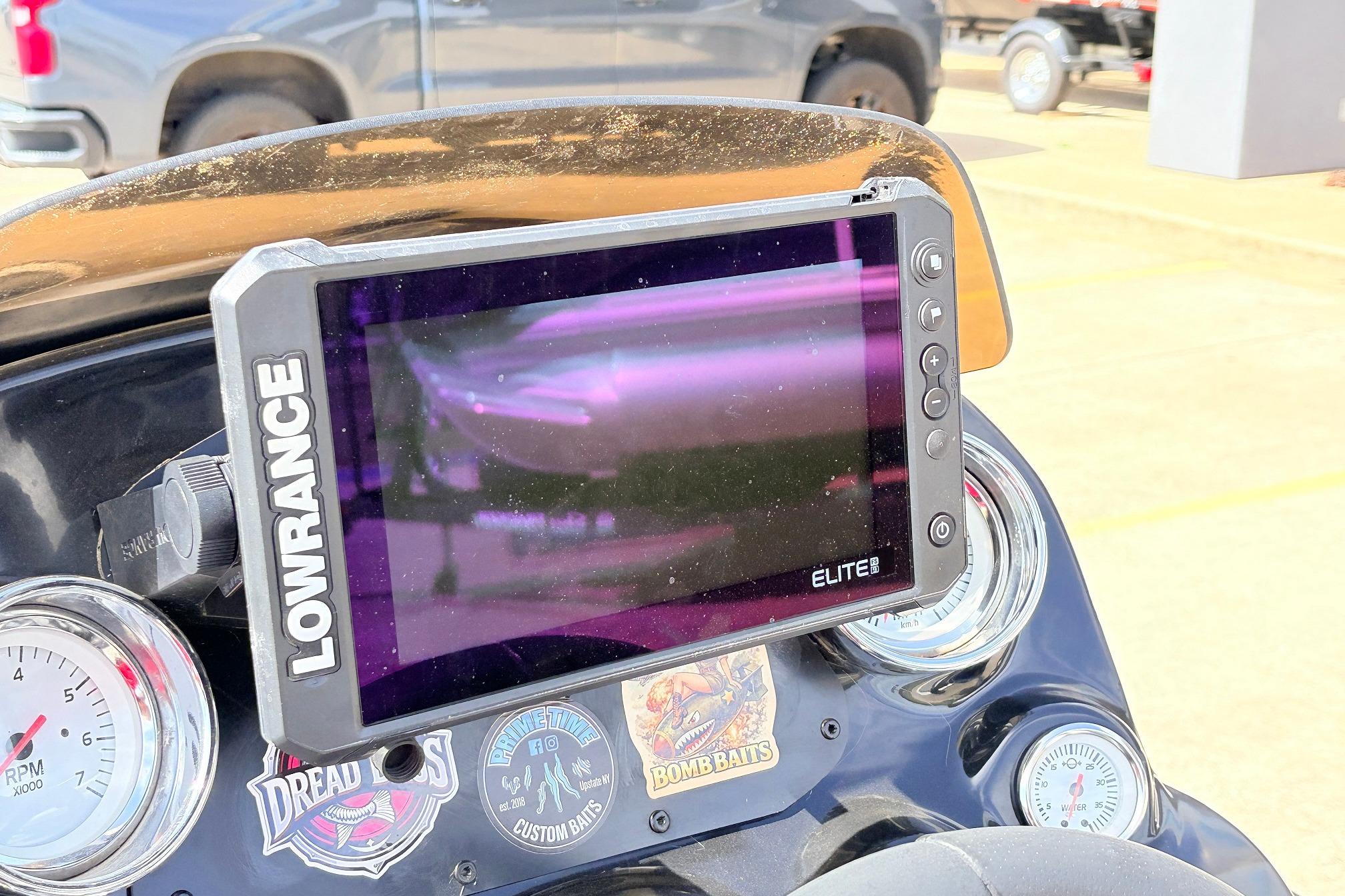 Lowrance Elite fishfinder on 2011 Nitro Z-7 boat dashboard with RPM gauge and stickers.
