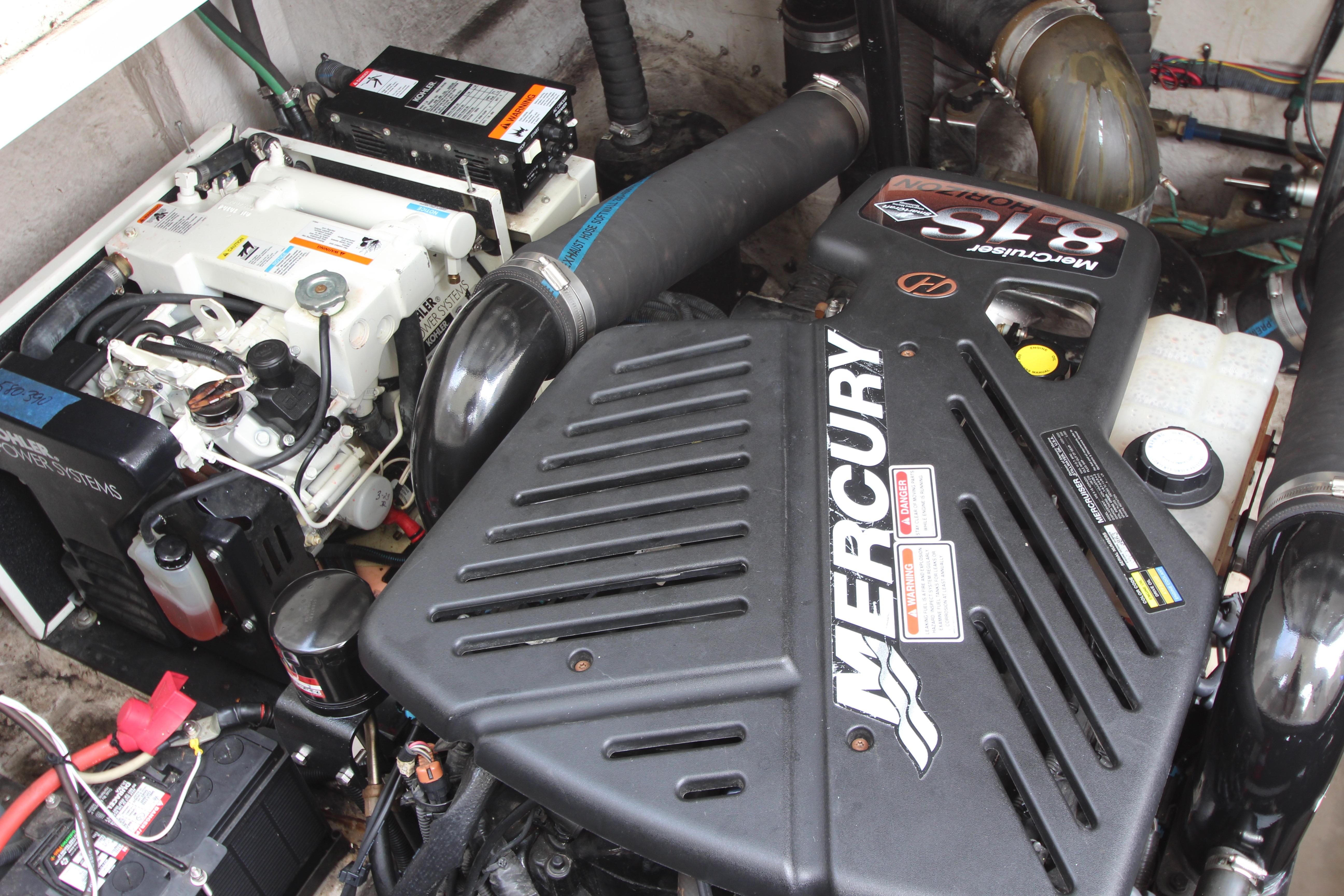 Engine compartment of a 2004 Sea Ray 40 Sundancer with Mercury components.