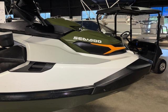 2020 Sea-Doo FISH PRO jet ski in showroom, featuring sleek design and vibrant colors.