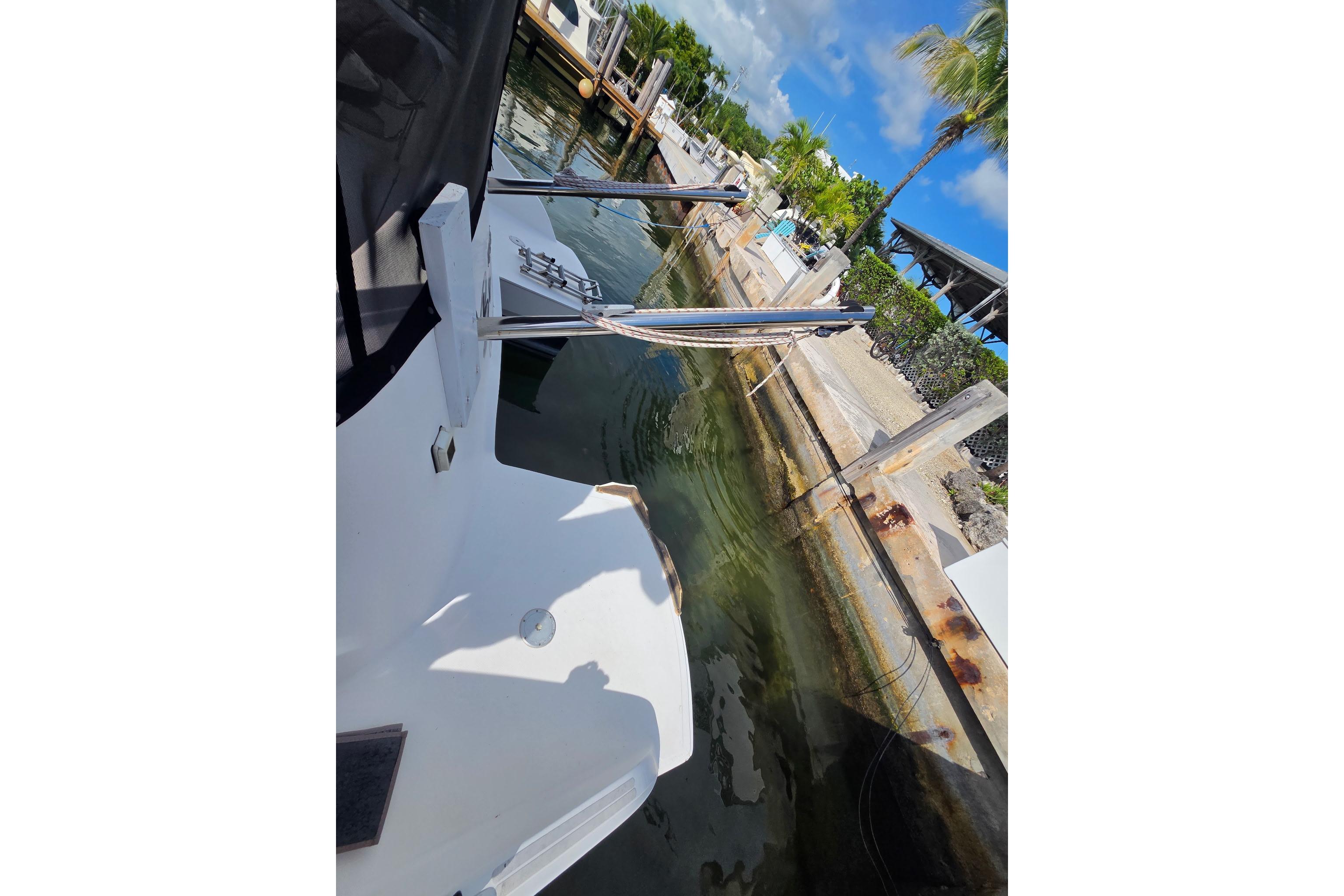 Fountaine Pajot Maryland 37 yacht docked at marina, 2000 model, sunny day.