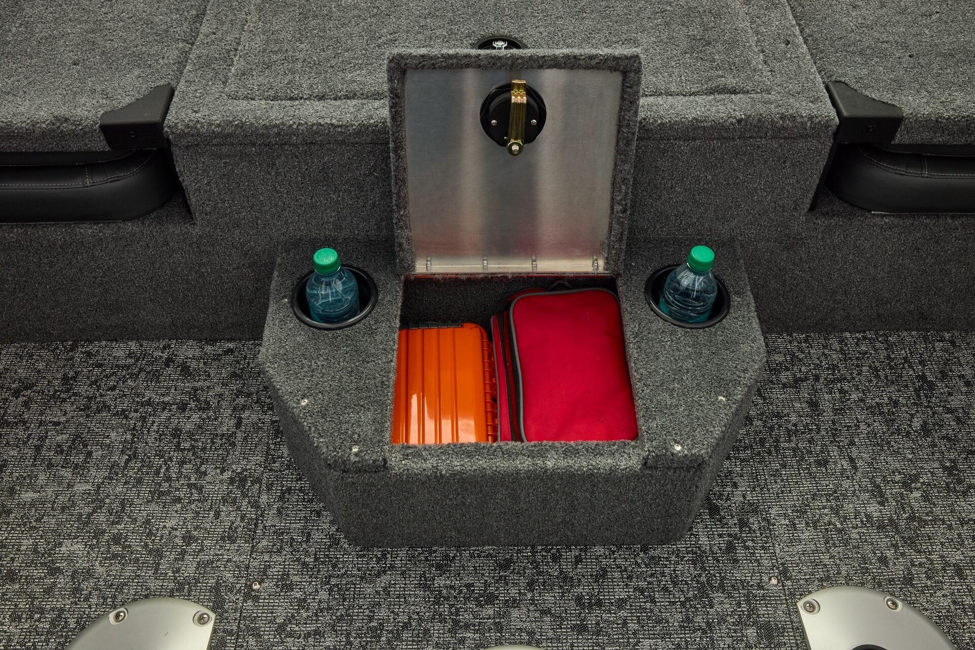 2026 Tracker Targa V-19 Combo boat storage compartment with cup holders and gear.