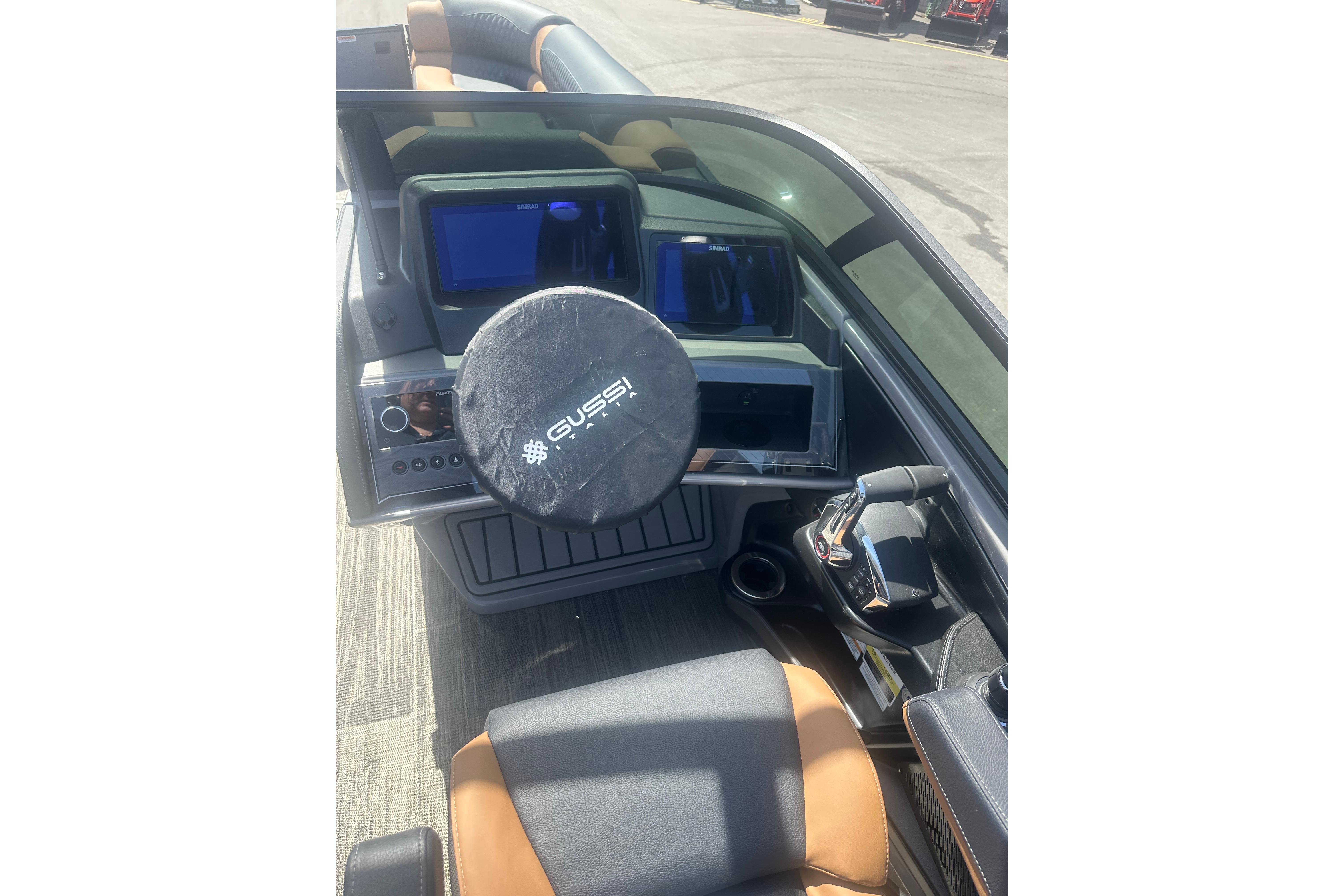 2026 Tahoe Pontoon Grand Tahoe LTD Elite Windshield dashboard with Gussi Italia steering wheel.