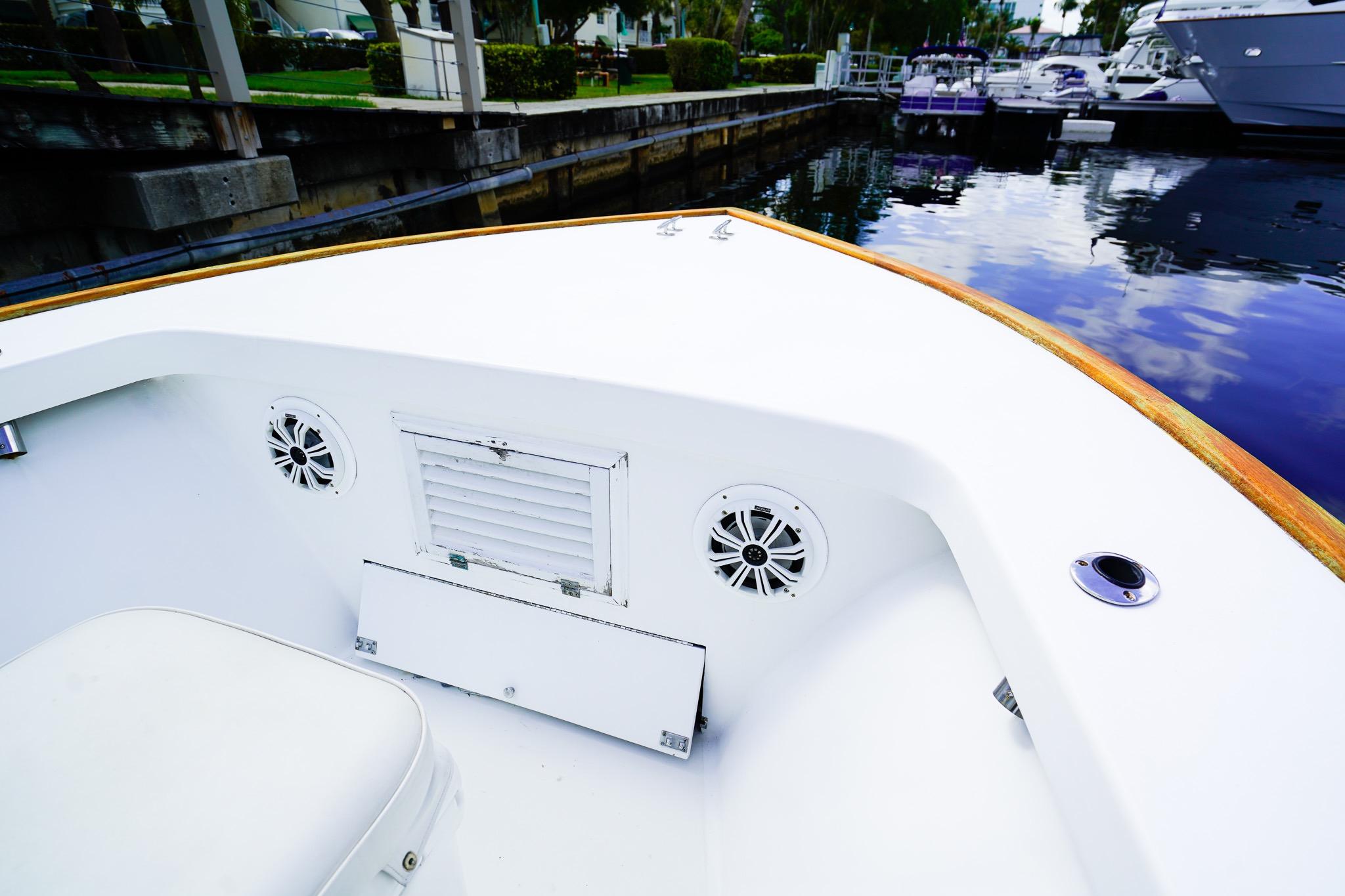 1977 Scarborough 27 CC boat interior with speakers, docked at marina.