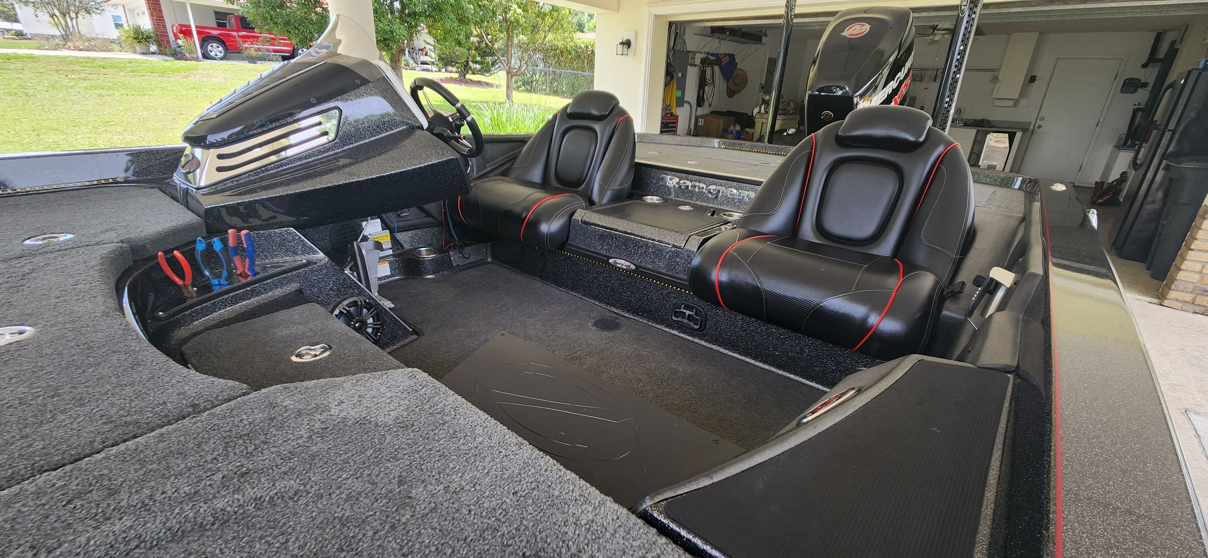 Interior view of a 2017 Ranger Z520 Comanche with black seats and gray carpet.