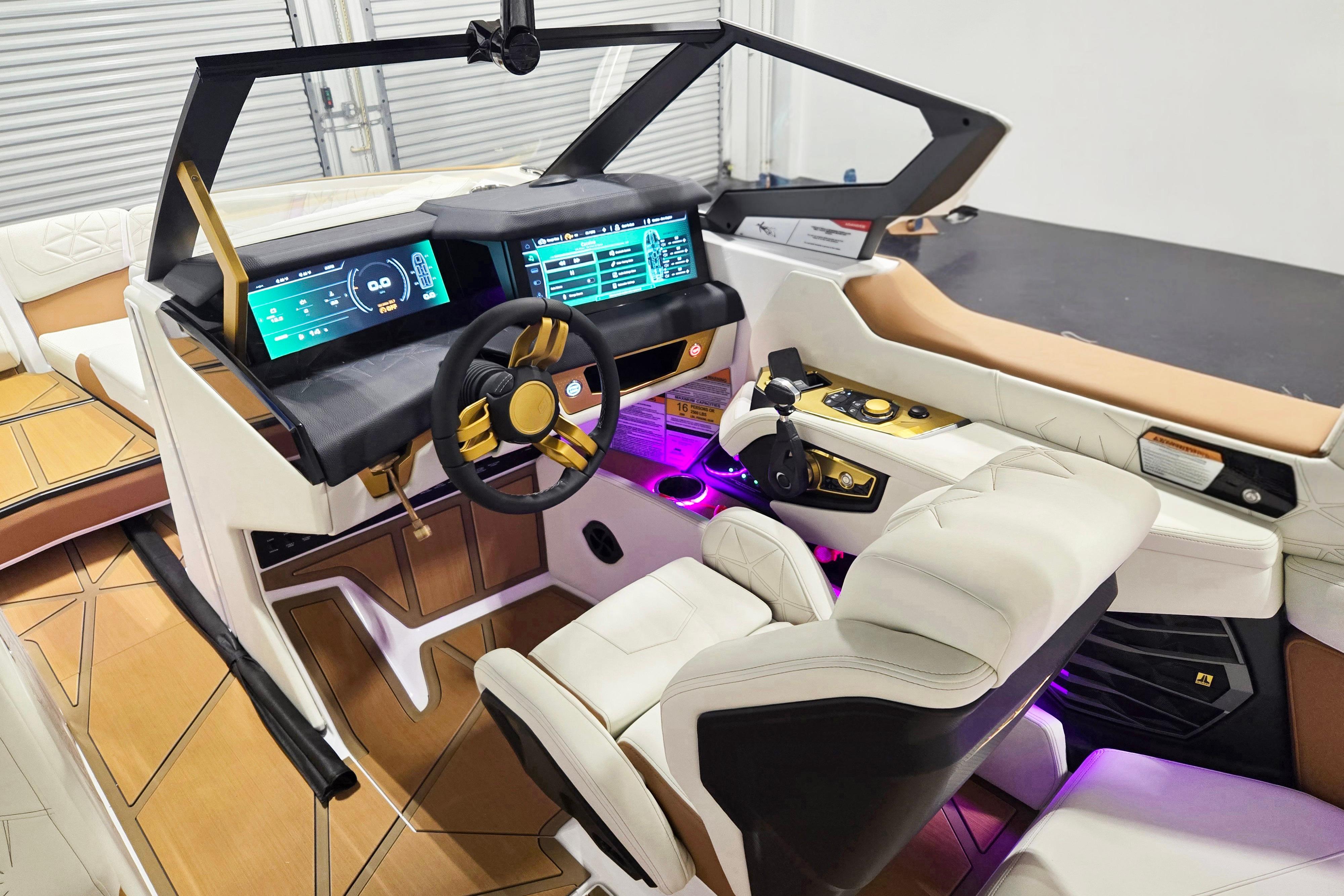 2026 Nautique Super Air Nautique G23 Paragon cockpit with advanced digital displays and luxurious seating.
