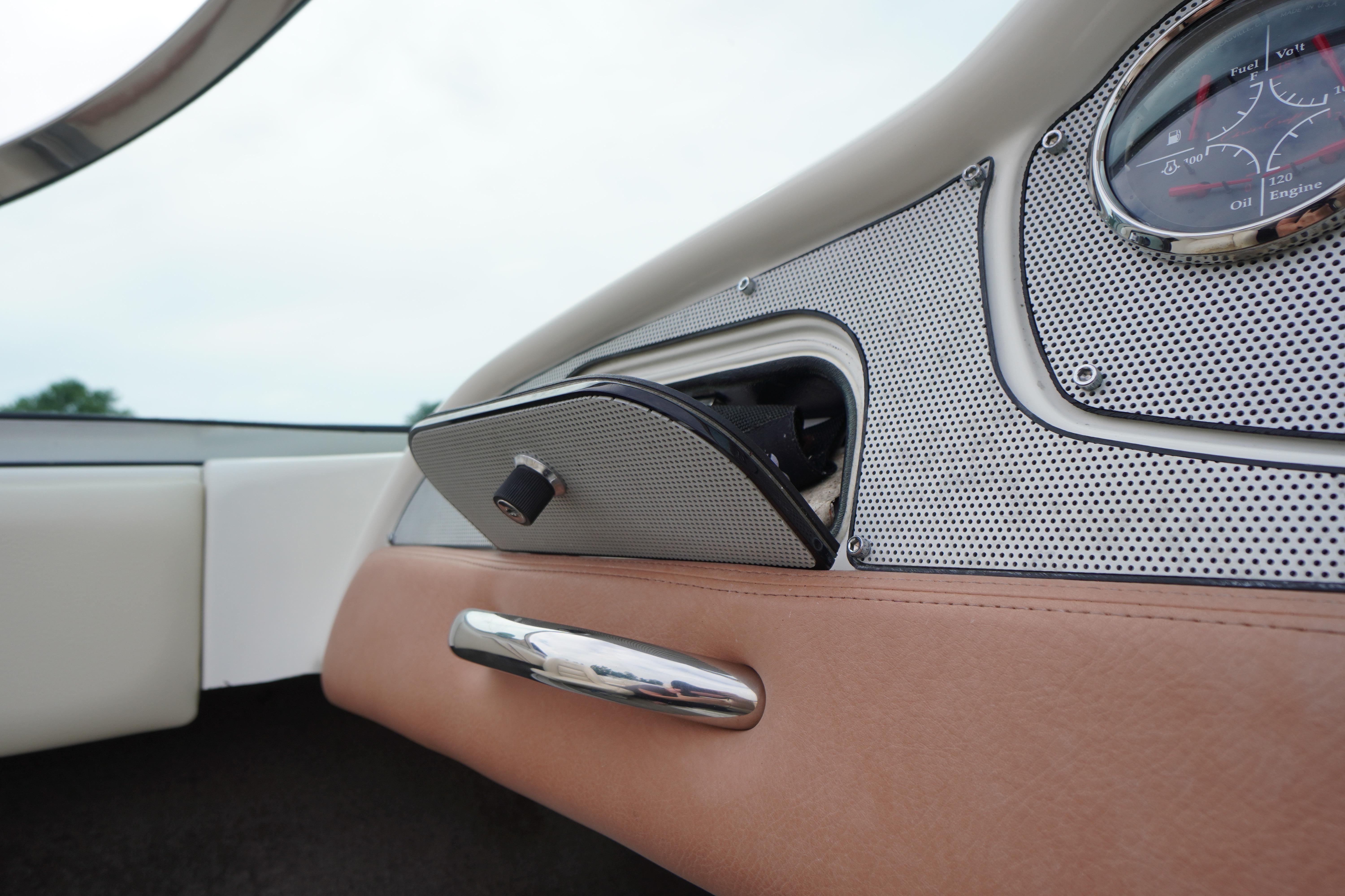 2005 Chris Craft Speedster Heritage dashboard with elegant leather and metal detailing.