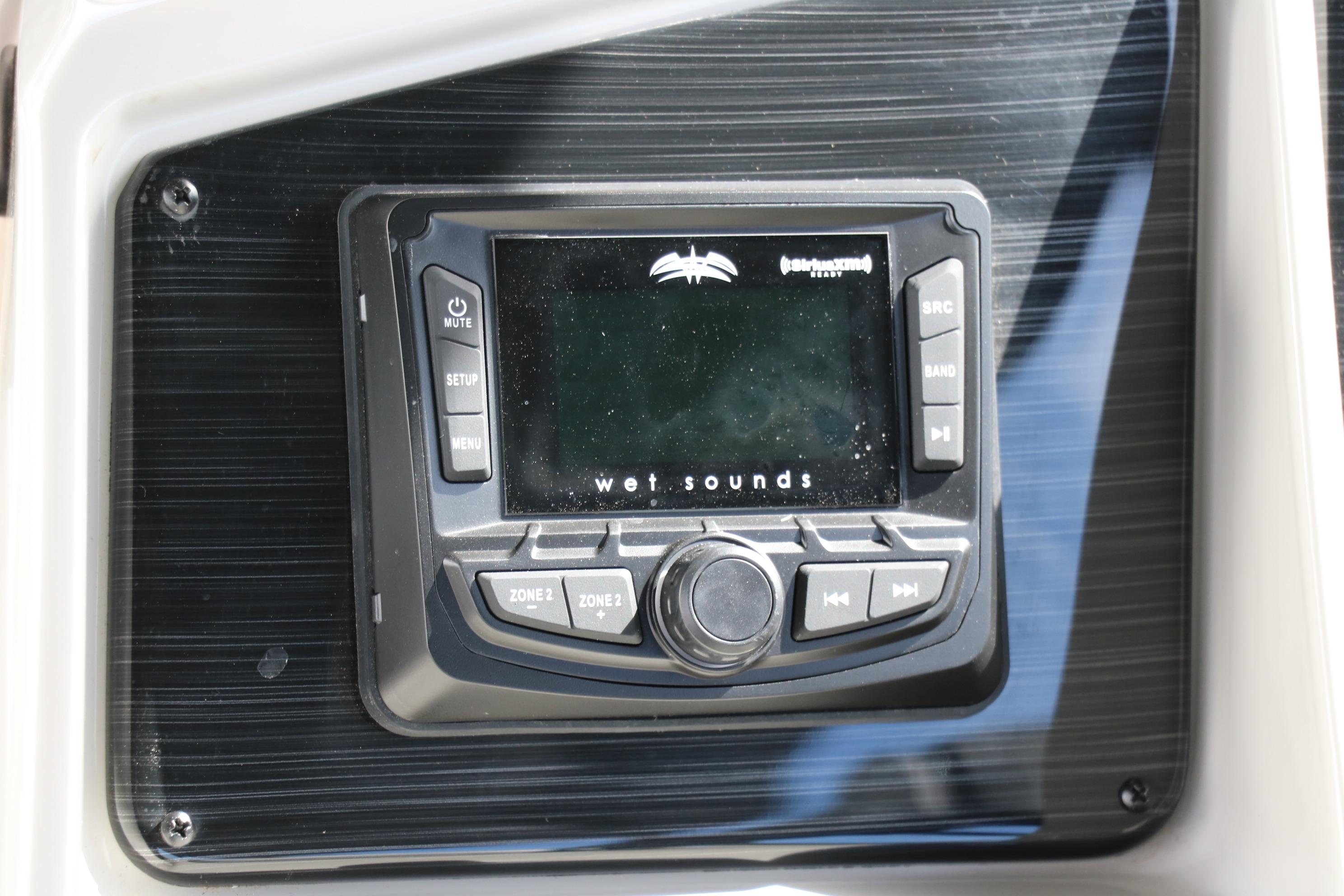 2025 Sylvan MIRAGE X3 DLZ BAR audio system with Wet Sounds control panel.