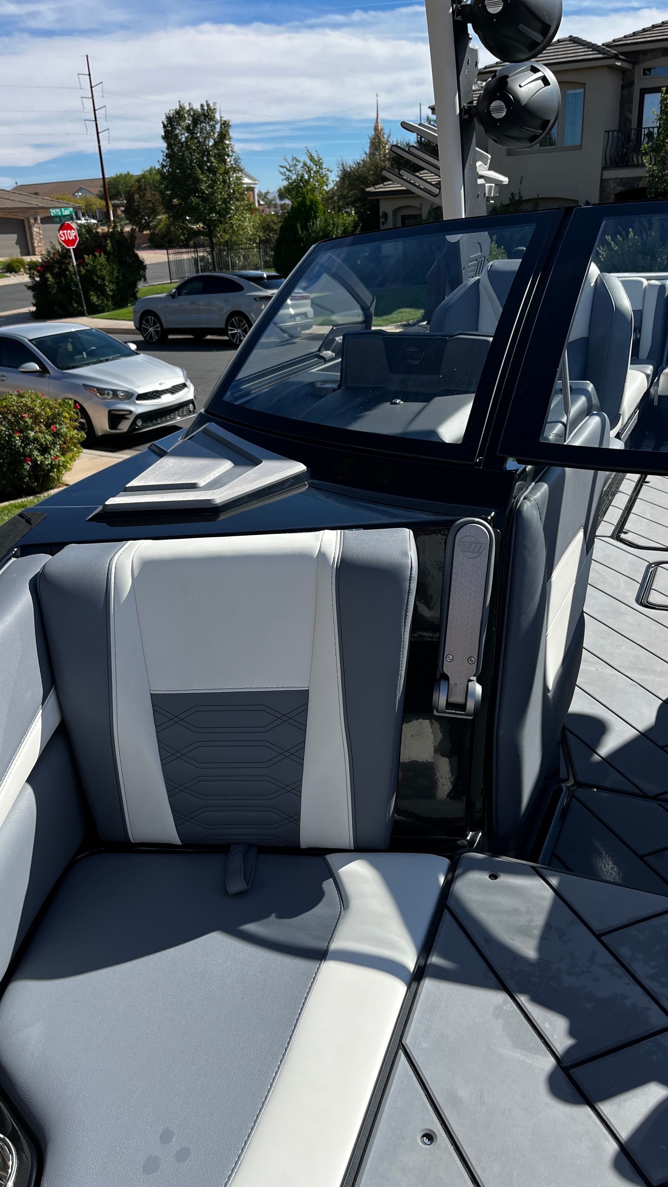 The image shows the interior of a 2023 Malibu Wakesetter 26 LSV with gray seating.