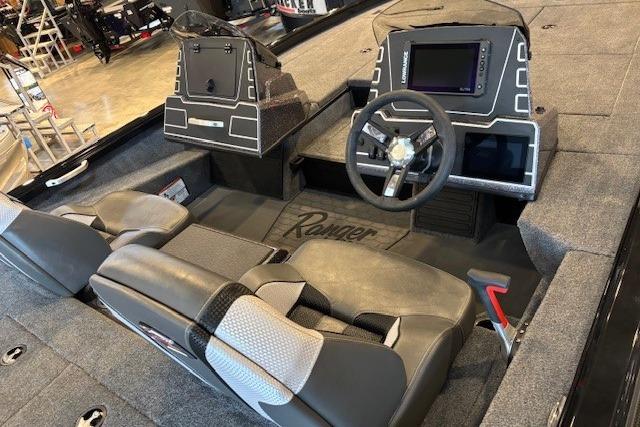 2025 Ranger ALPHA 208 boat interior with modern dashboard and seating.