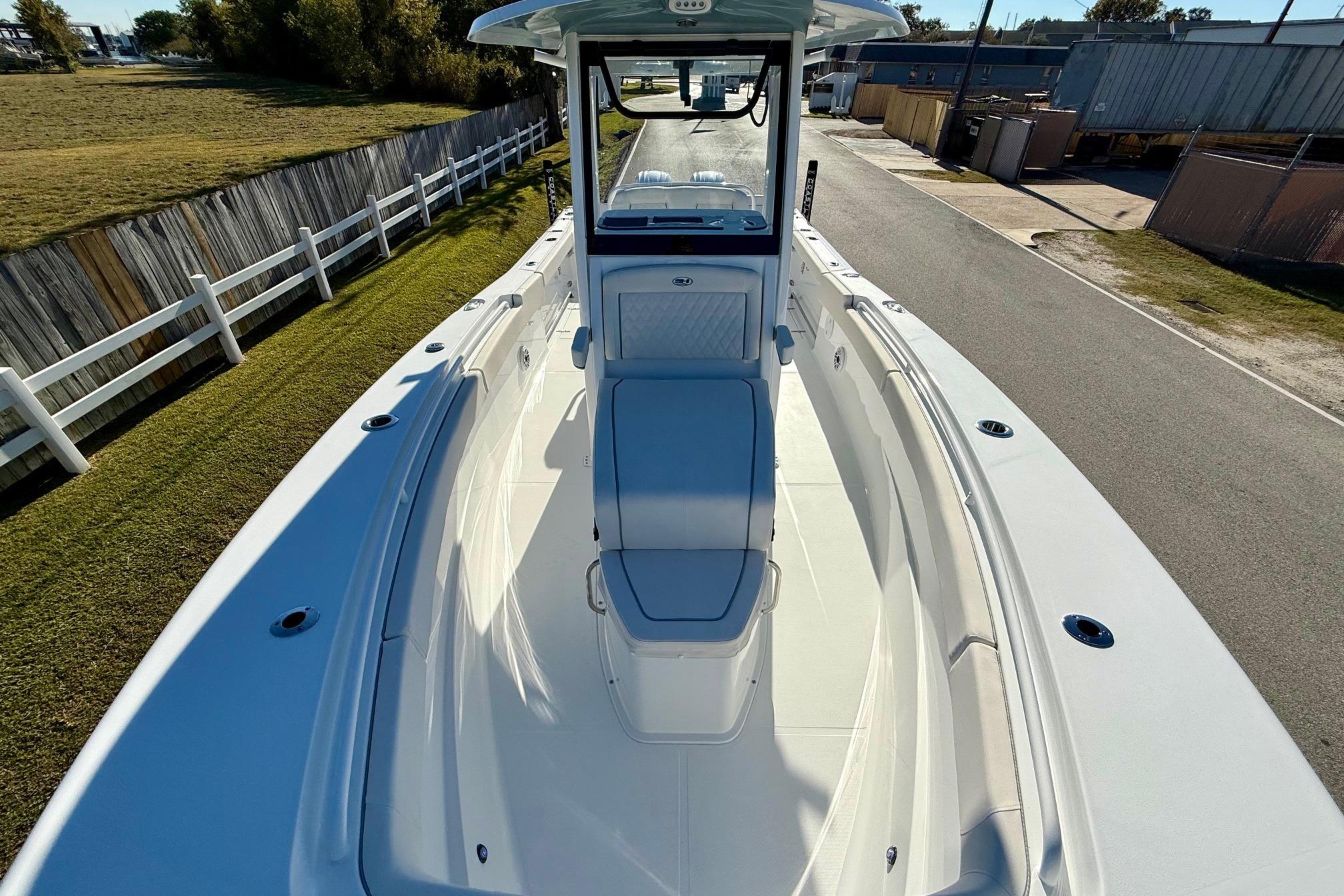 2026 Sea Hunt Ultra 275 Coffin Box boat, spacious deck view, white finish.
