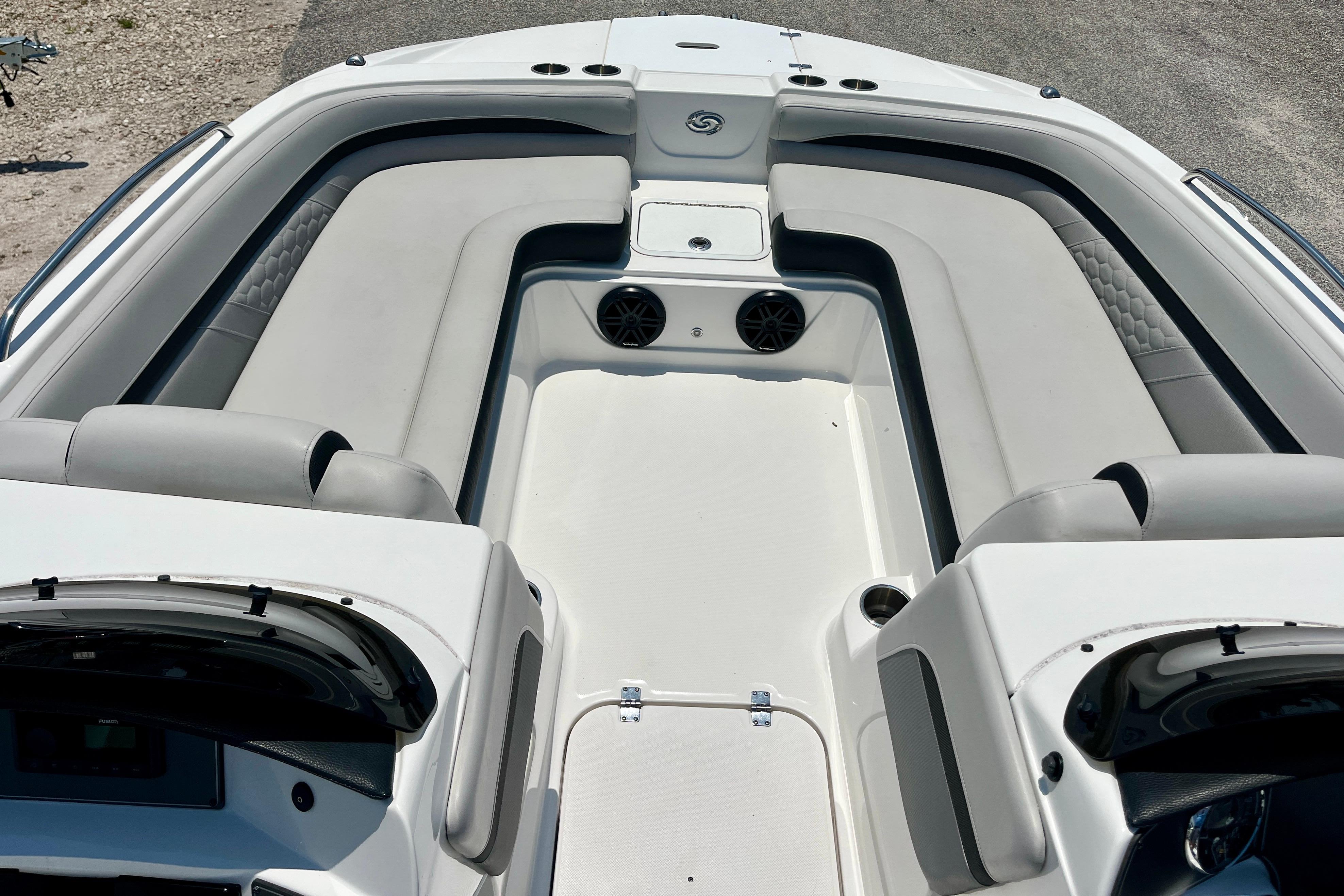 2024 Hurricane Sundeck Sport 218 OB boat interior with spacious seating and modern design.