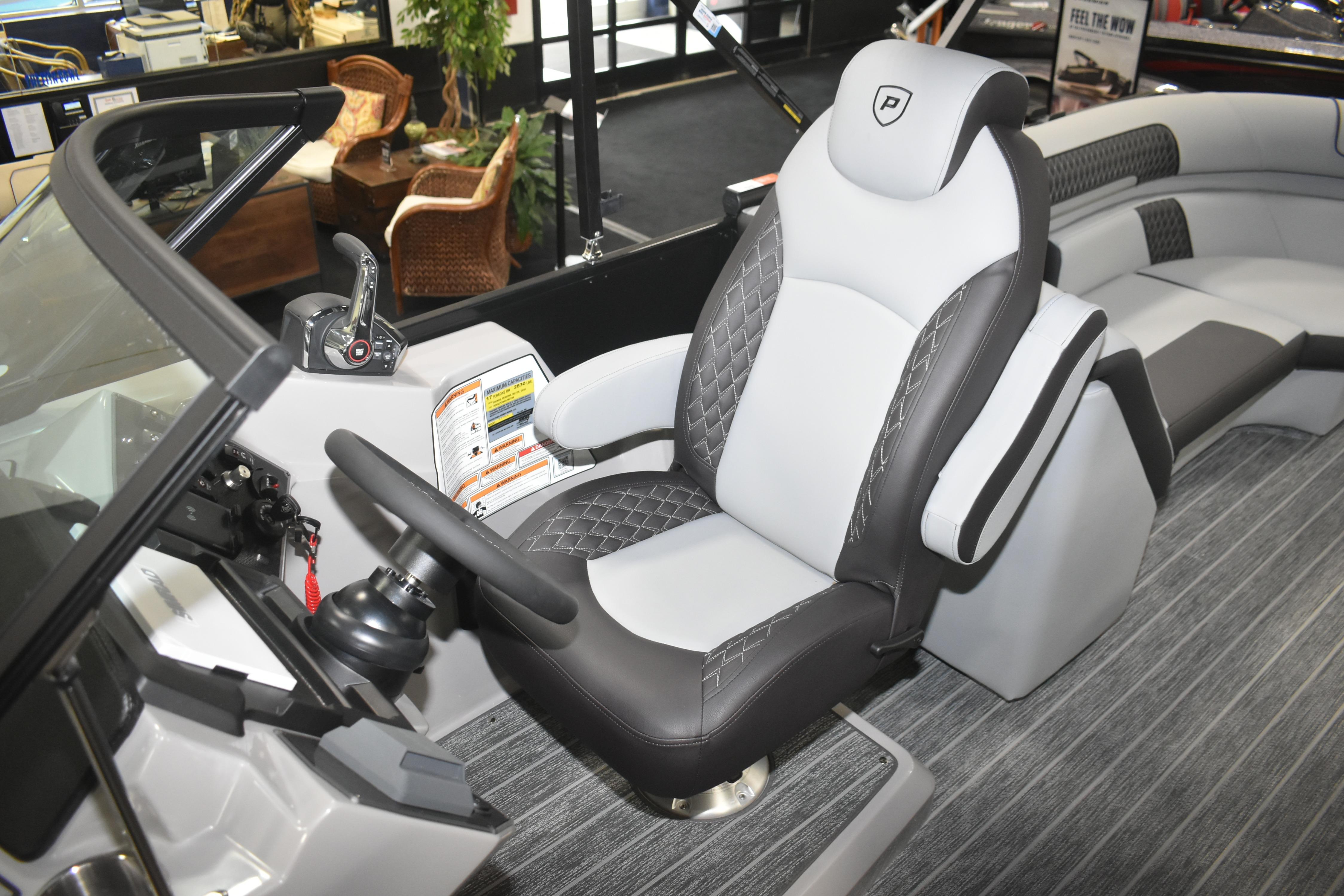 2026 Premier 250 Solaris Sport boat interior with luxurious seating and modern controls.