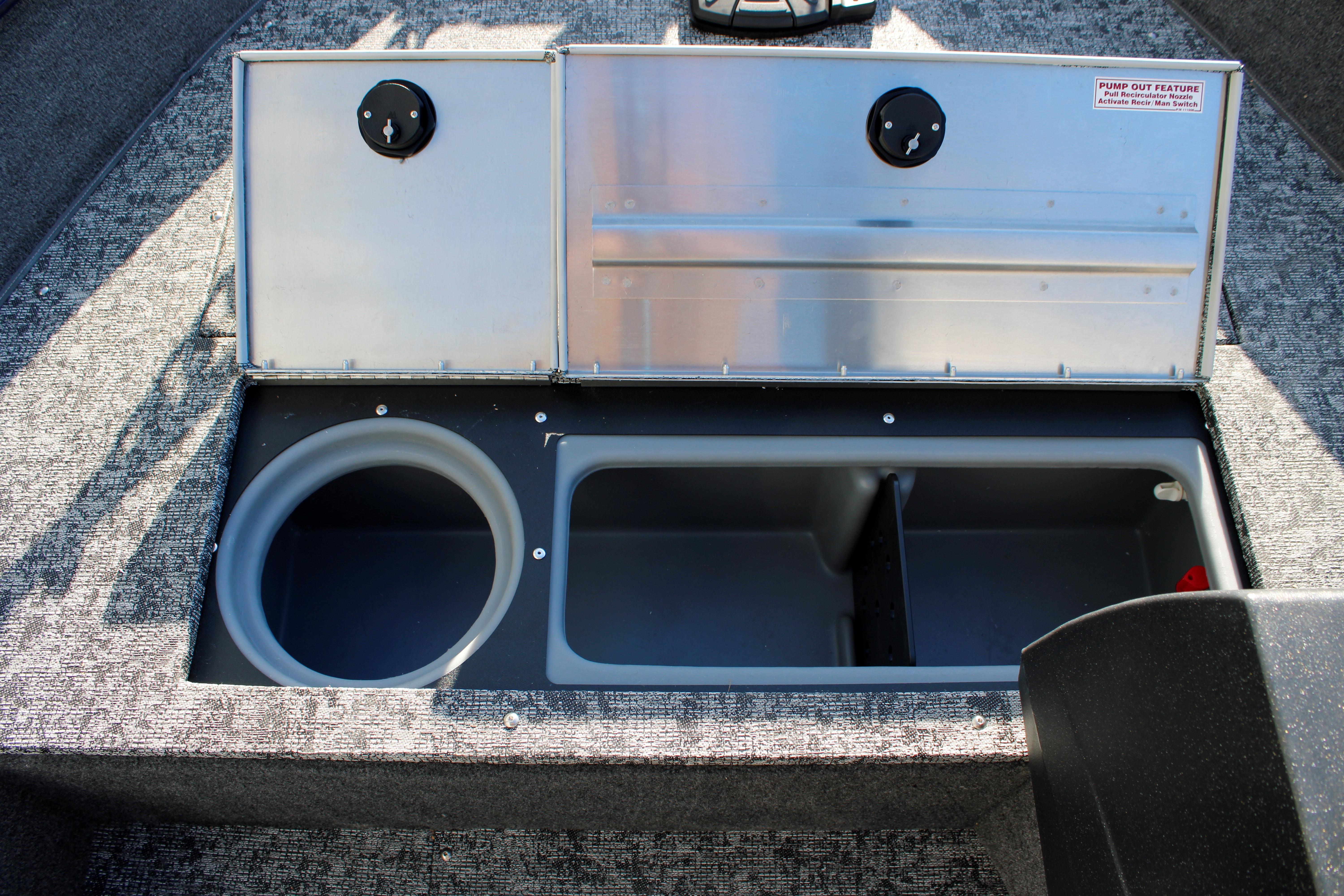 2026 Tracker Pro Guide V-16 SC boat storage compartments open, showcasing interior design.