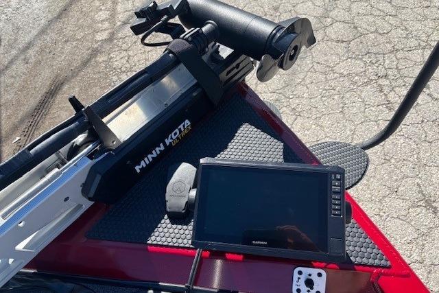 2025 Tracker Savage 215 boat with Minn Kota motor and Garmin display on deck.