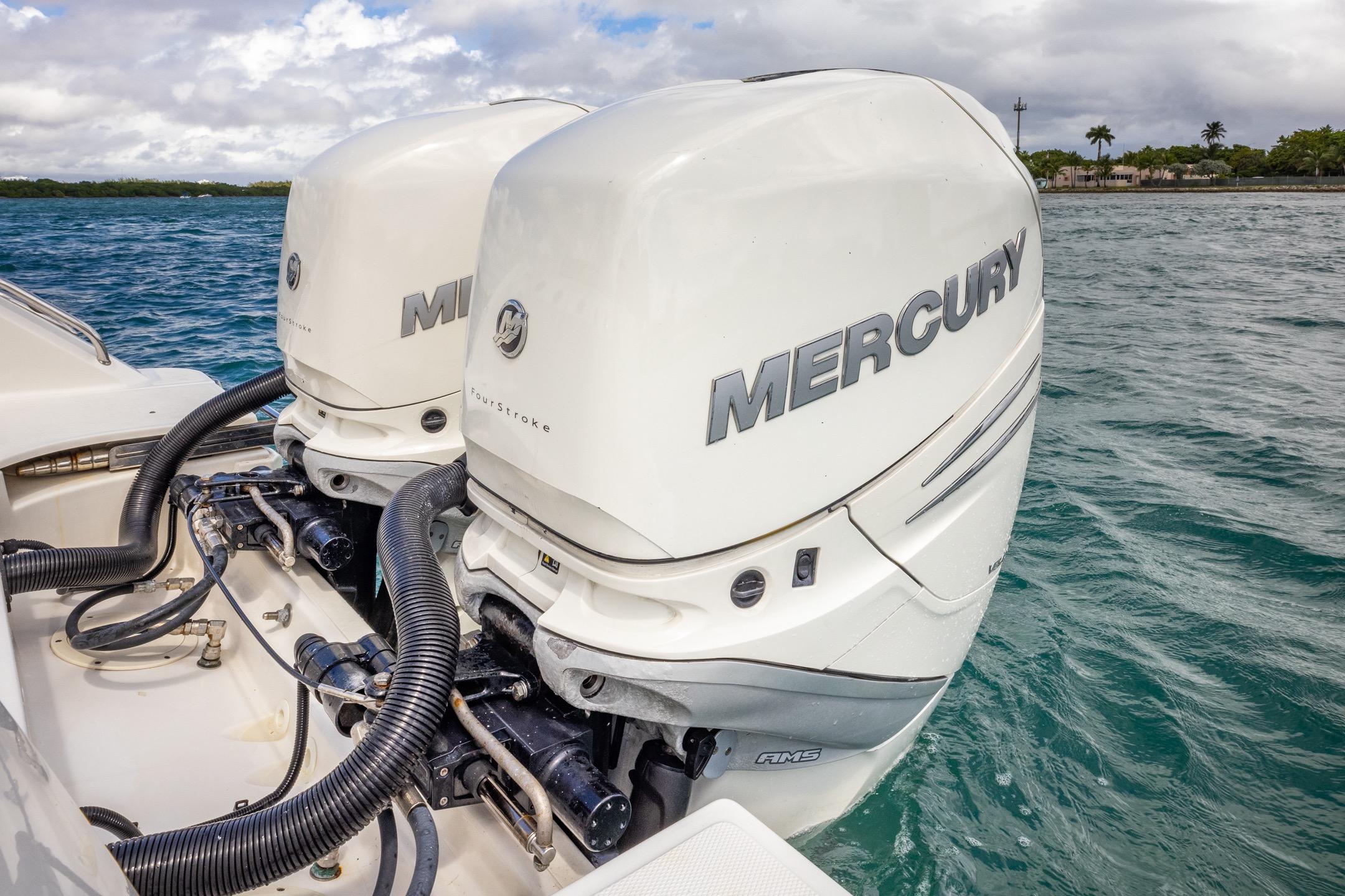 2016 Boston Whaler 280 Outrage with twin Mercury outboard engines on the water.