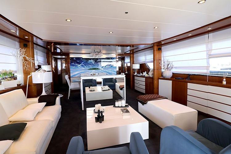 Luxurious interior of 2000 Sanlorenzo SL88 yacht with elegant furnishings and modern decor.