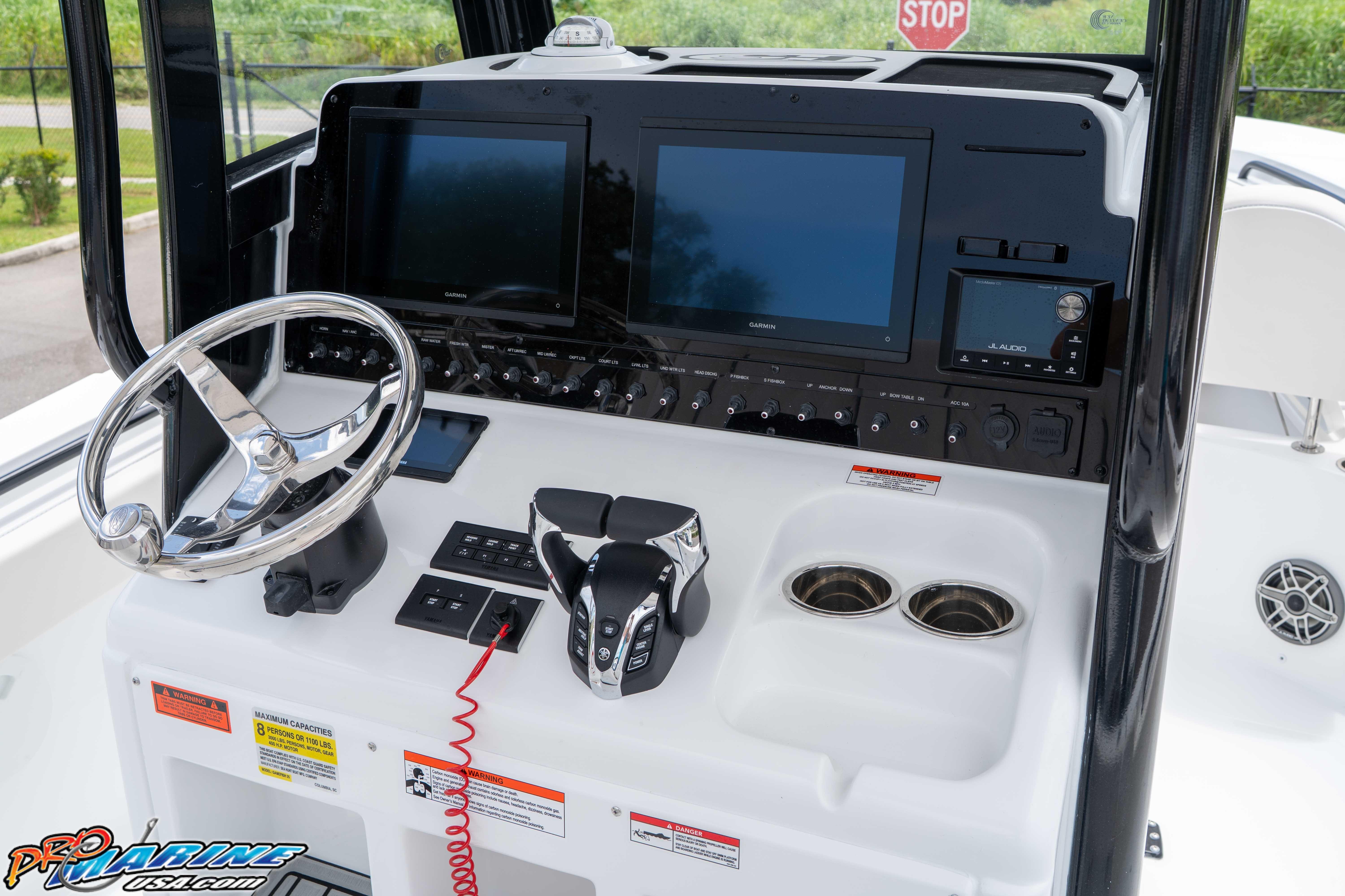 2026 Sea Hunt Gamefish 25 dashboard with dual screens and modern controls.