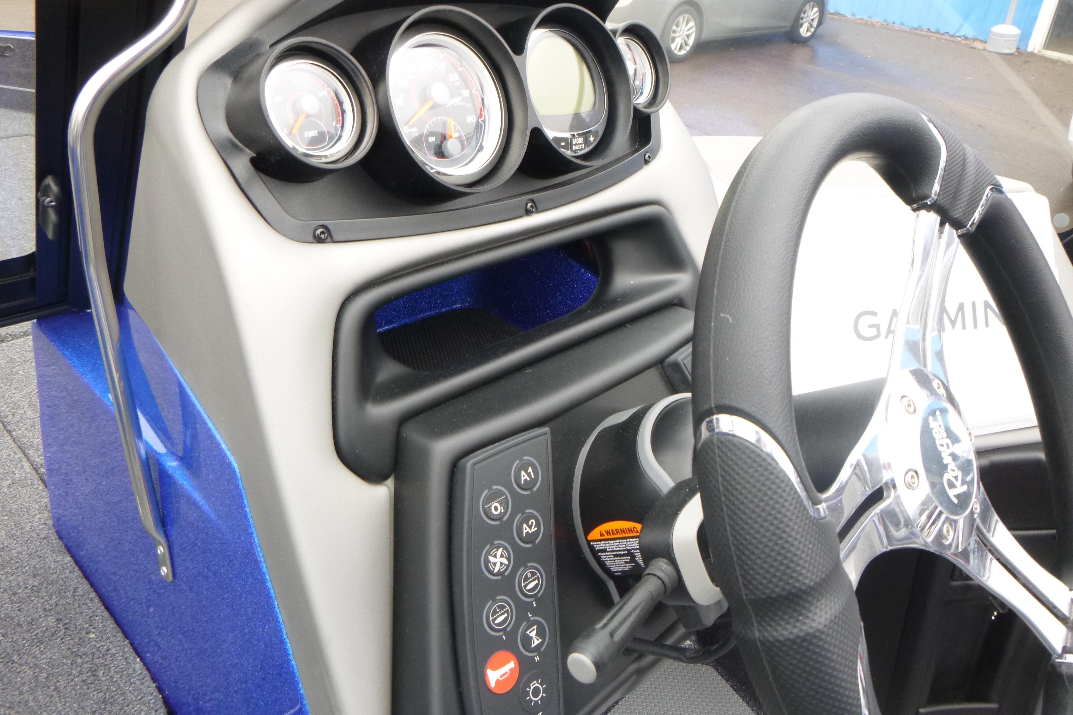 2026 Ranger 620FS Cup Equipped boat dashboard with steering wheel and control panel.