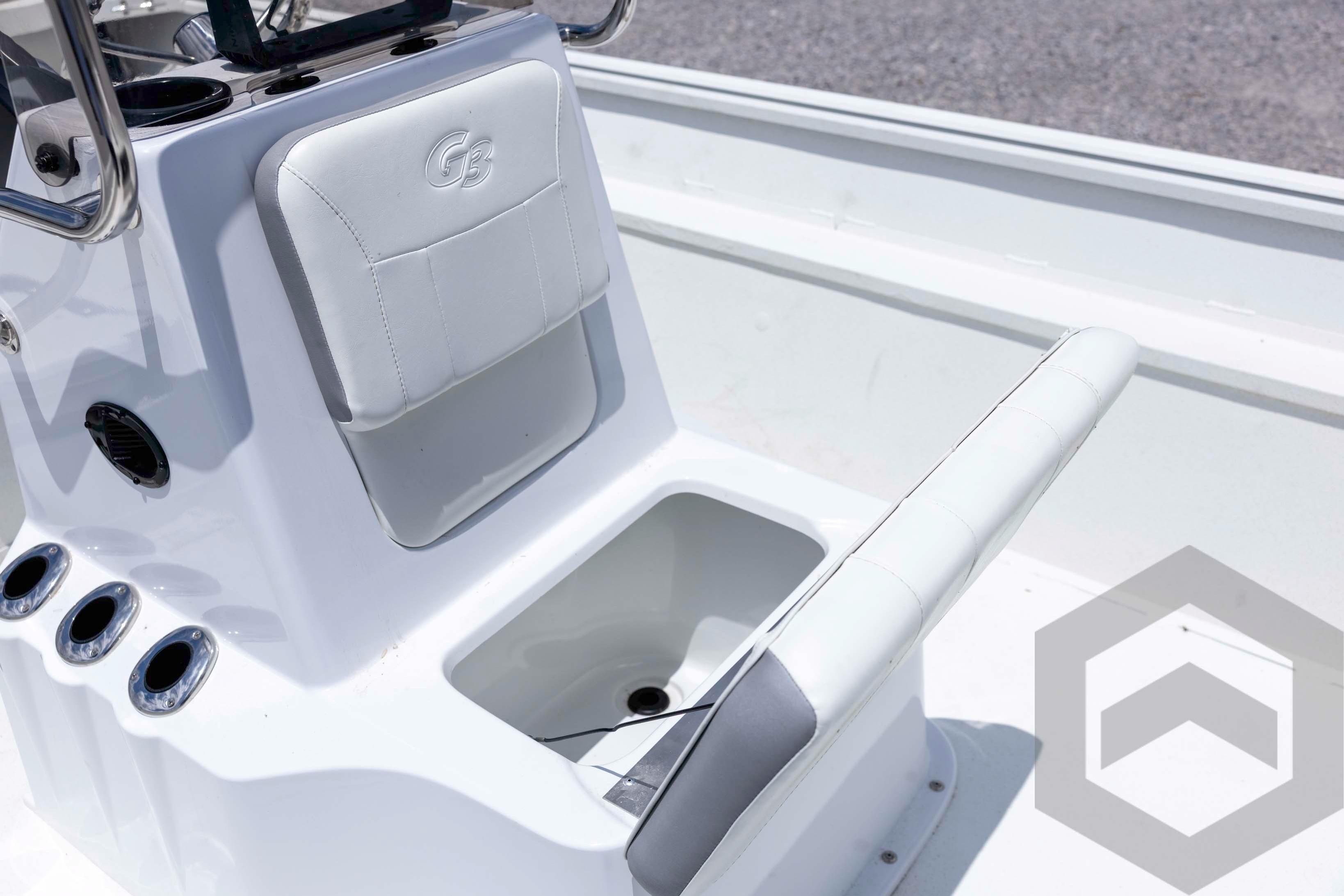 2026 G3 Bay 20 boat console with seating and storage compartment.