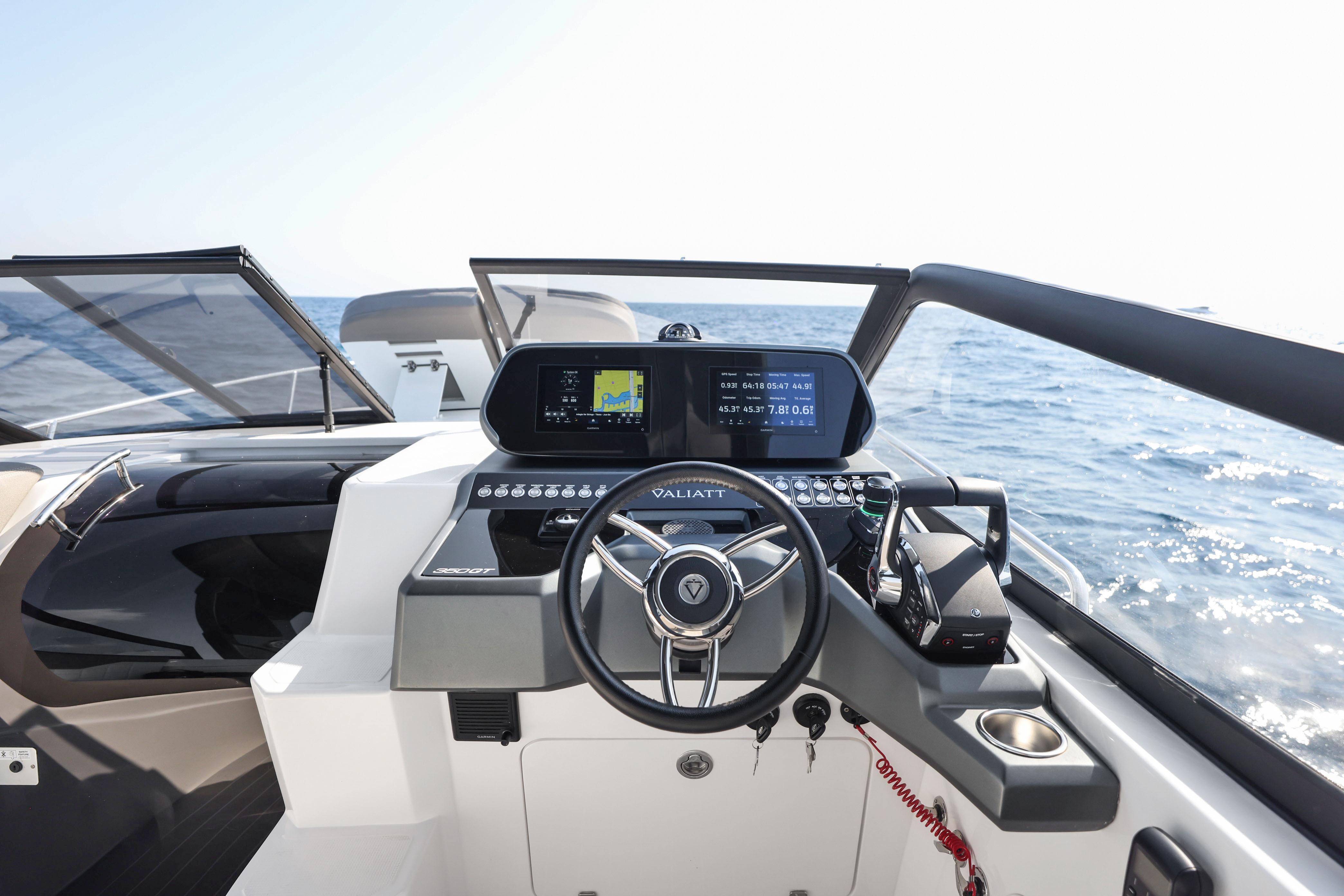 2025 Valiatt 350GT boat cockpit with modern navigation system and steering wheel.