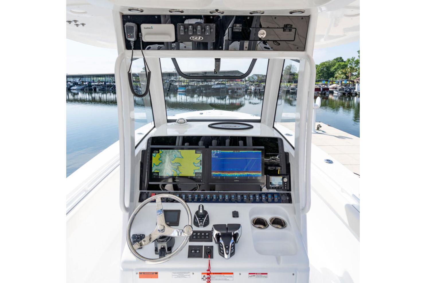 Manufacturer Provided Image: 2026 Sea Hunt Gamefish 30 Coffin Box dashboard with navigation screens and controls.