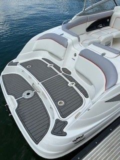 2008 Yamaha AR230 boat with gray deck on water.