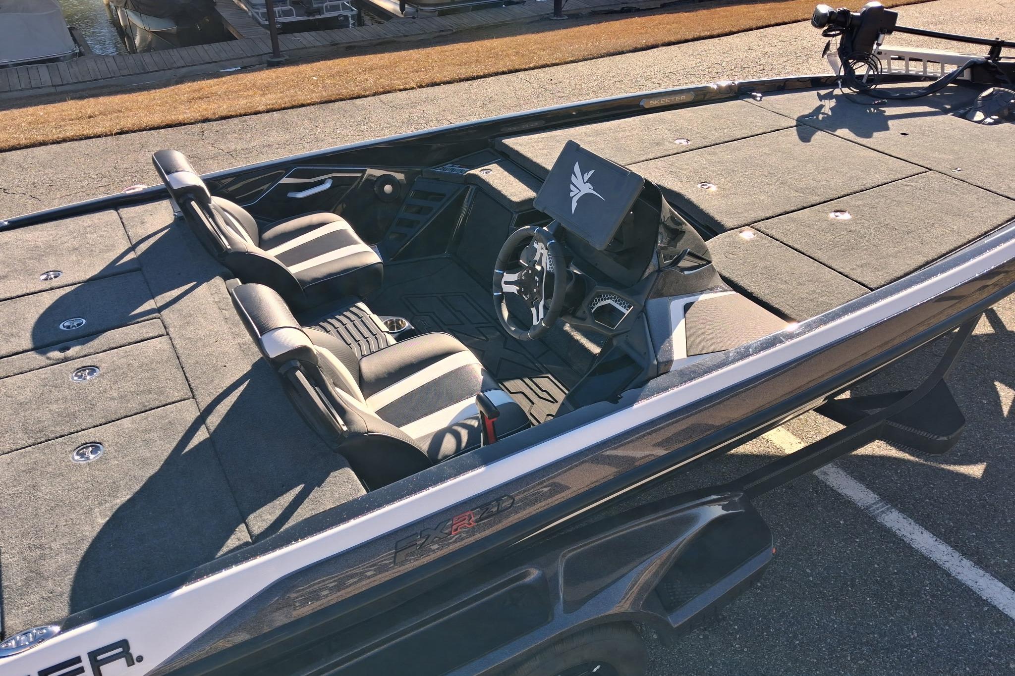 2026 Skeeter FXR21 FLEX boat interior with dual seats and modern dashboard.
