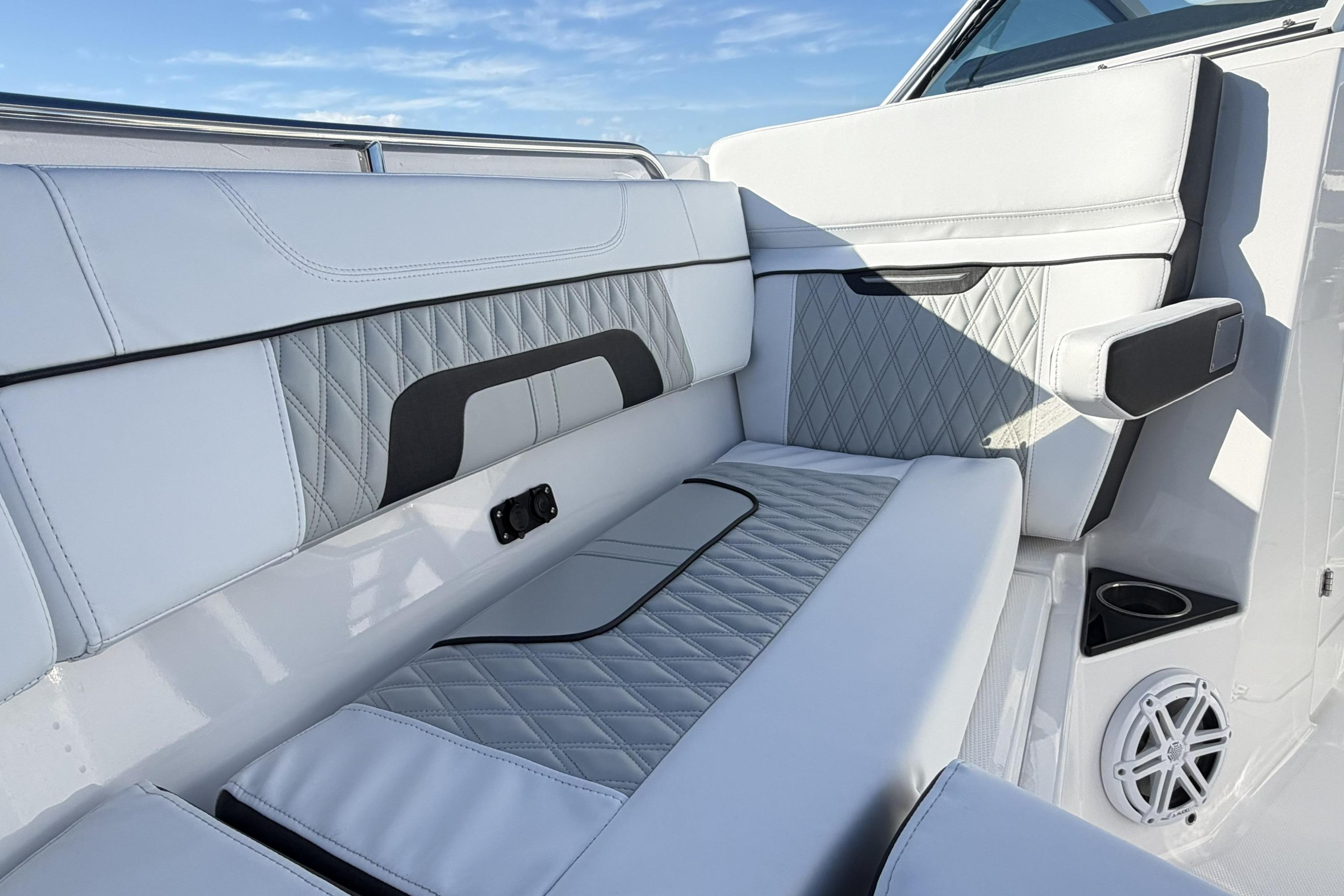 Luxurious seating on 2025 Blackfin 272 DC boat with modern design and premium materials.