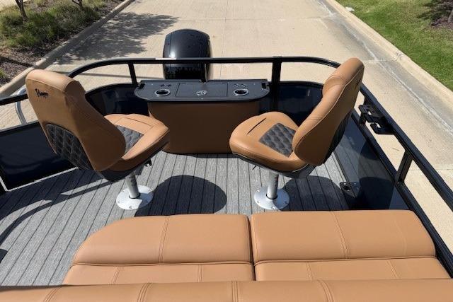 2026 Ranger 223F boat interior with tan seats and sleek design.